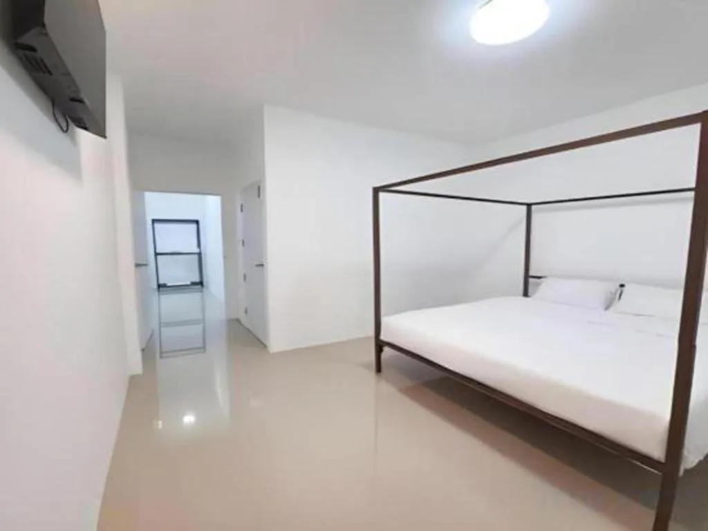 Bed in WICKET WHITE VILLA