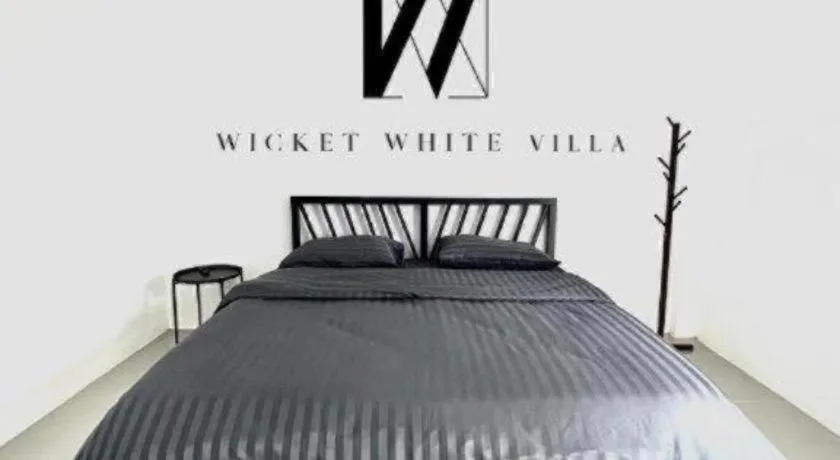 Bed in WICKET WHITE VILLA