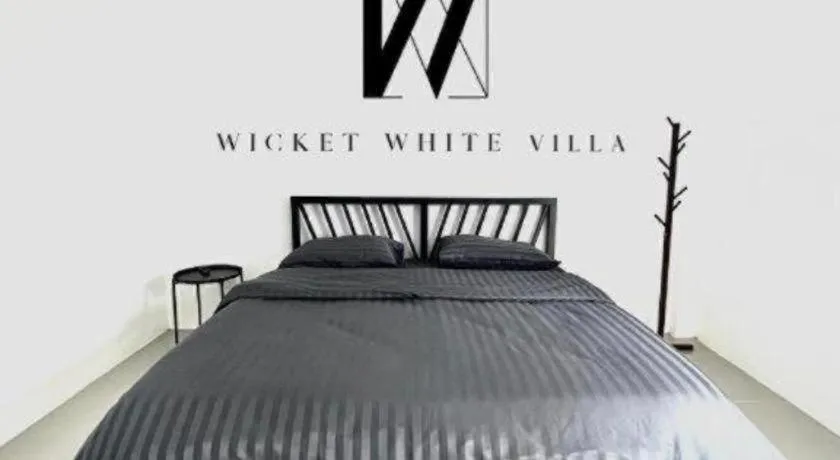 Bed in WICKET WHITE VILLA