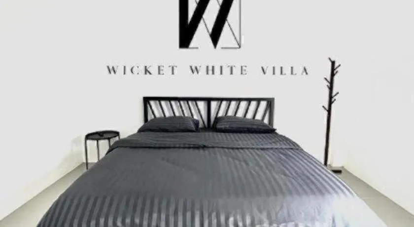 Bed in WICKET WHITE VILLA
