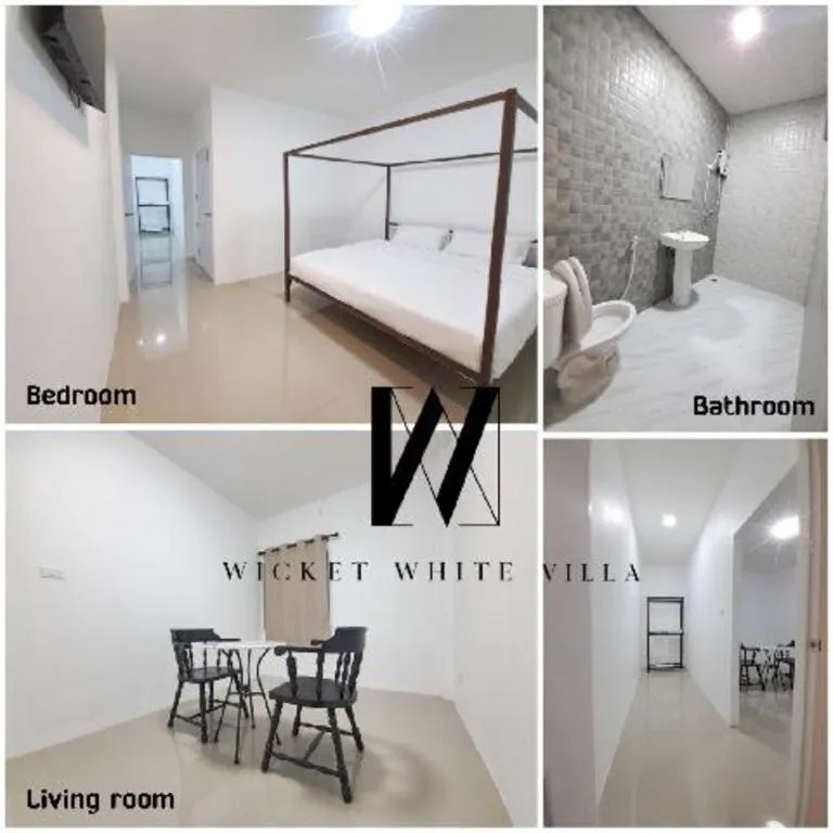 Bed in WICKET WHITE VILLA