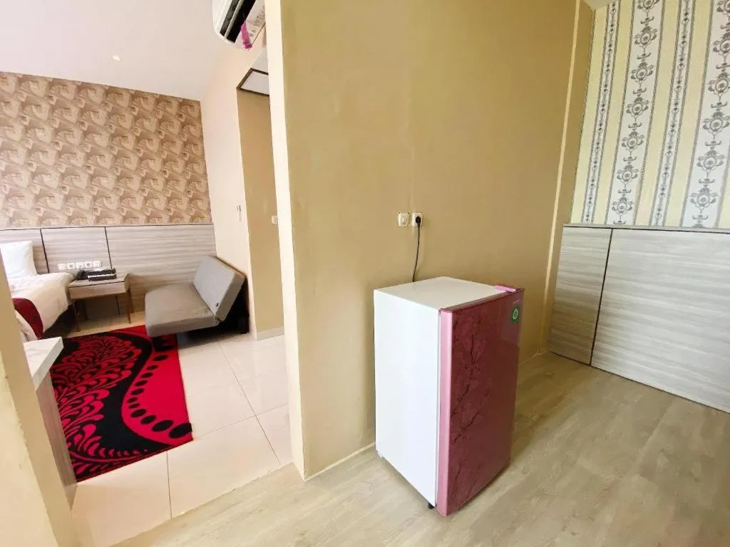 Bed in Sumbawa Grand Hotel