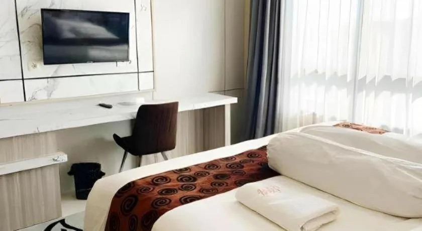 Bed in Sumbawa Grand Hotel