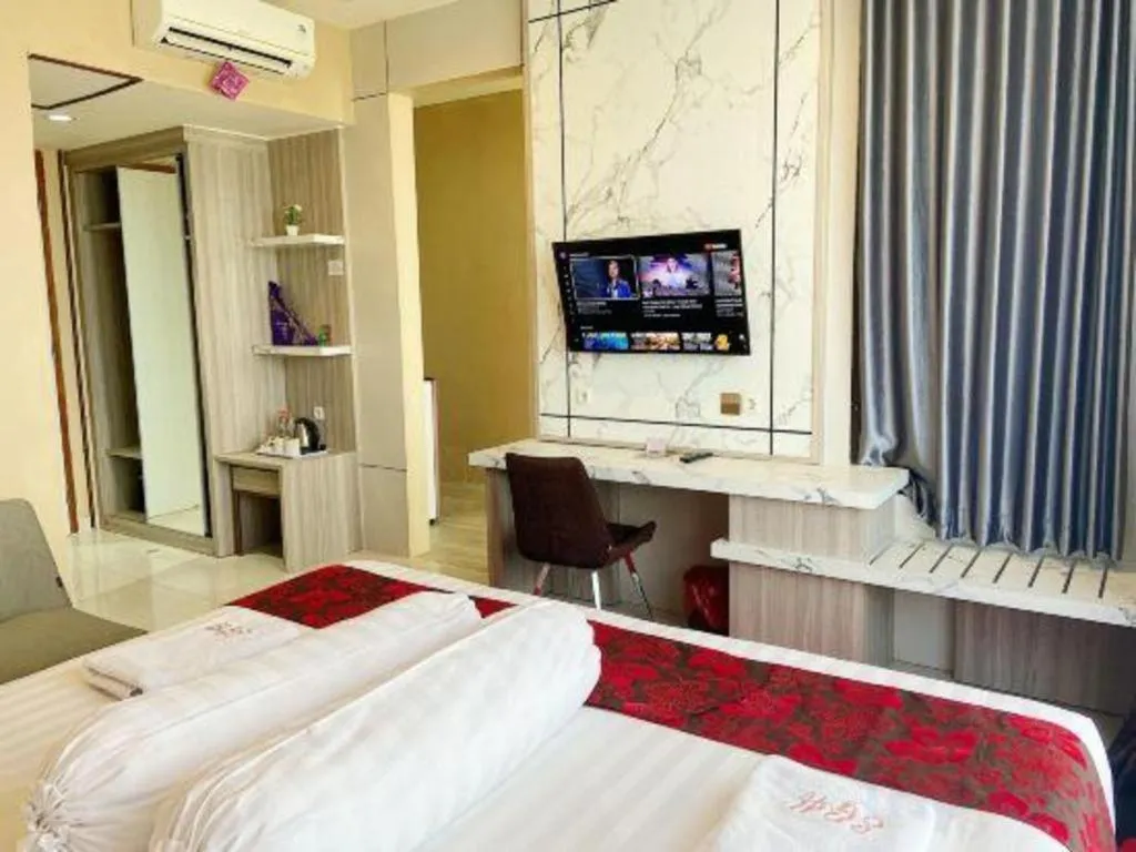 Bed in Sumbawa Grand Hotel