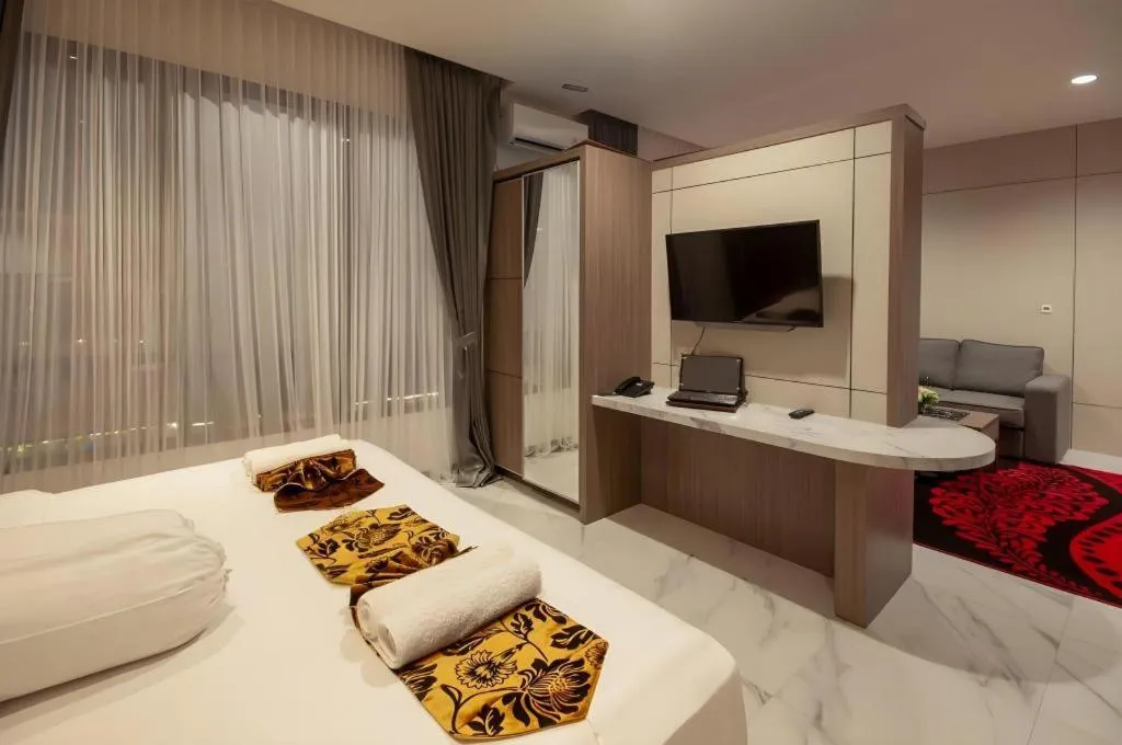 Bed in Sumbawa Grand Hotel