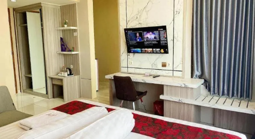 Bed in Sumbawa Grand Hotel