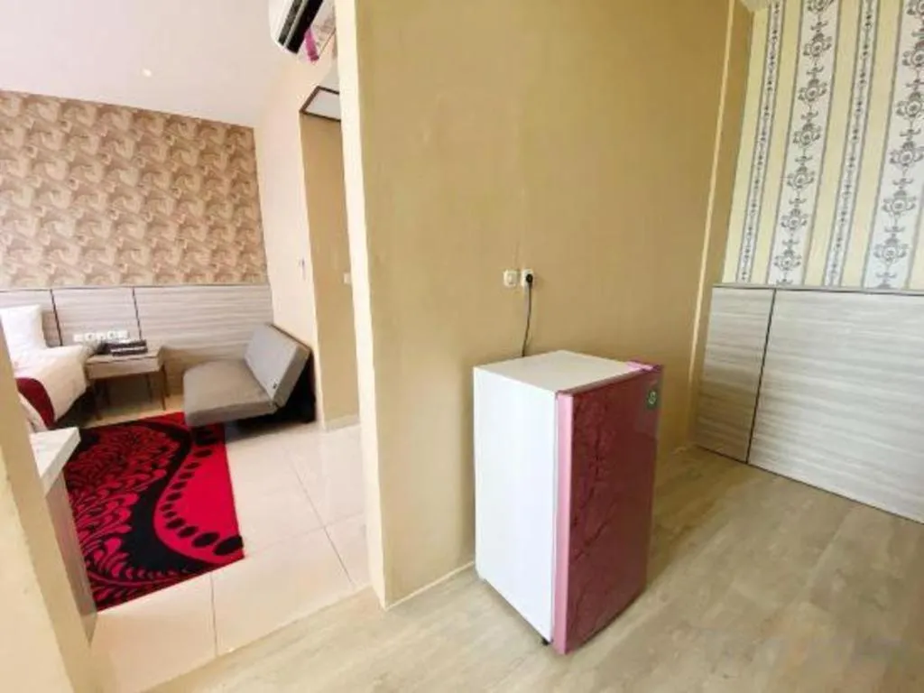 Bed in Sumbawa Grand Hotel