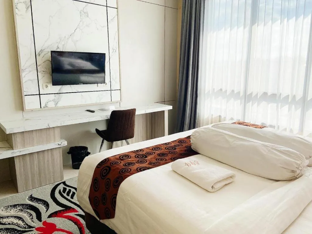 Bed in Sumbawa Grand Hotel