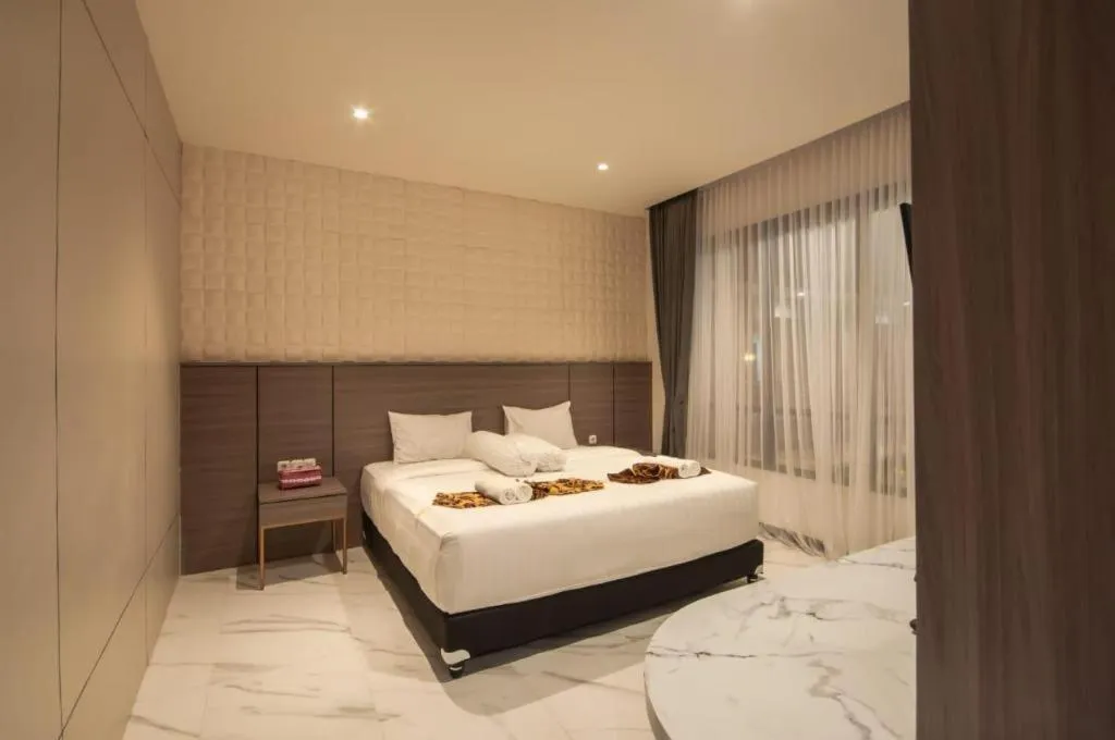 Bed in Sumbawa Grand Hotel