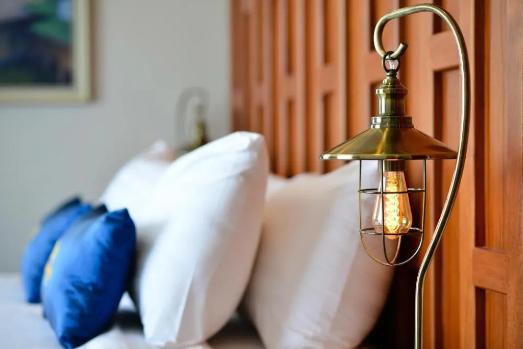 Bed in Amphawa Riverfront Hotel