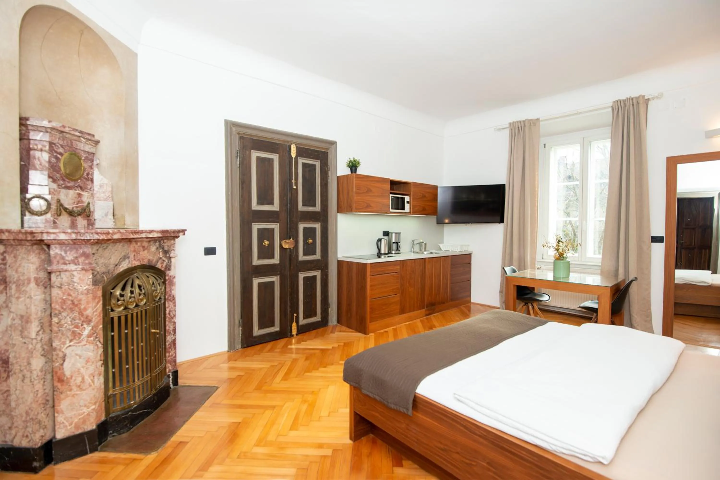 Bed in Zois Apartments