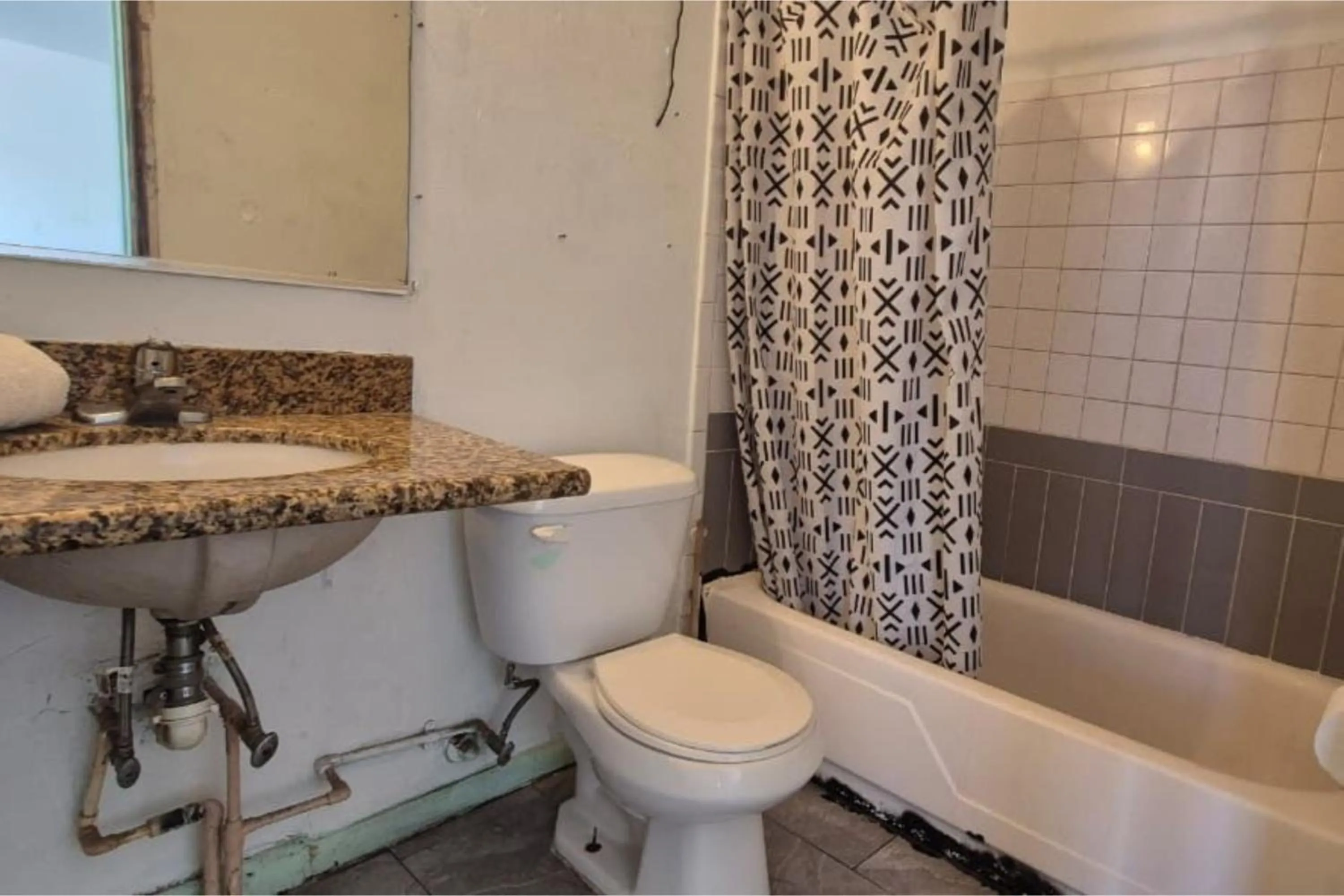 Bathroom in Base Motel By OYO South Tampa