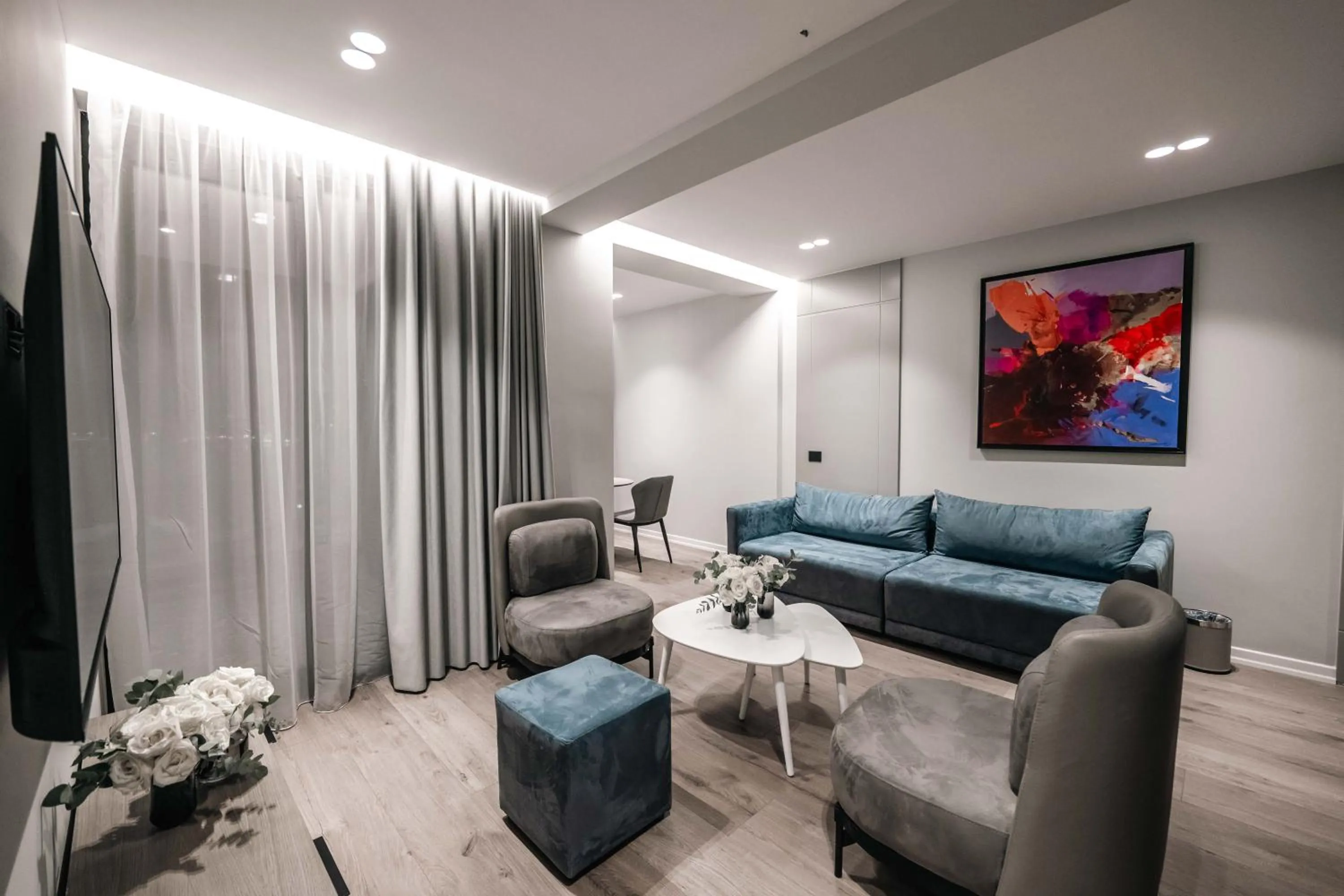 TV and multimedia in Boe Luxury Hotel