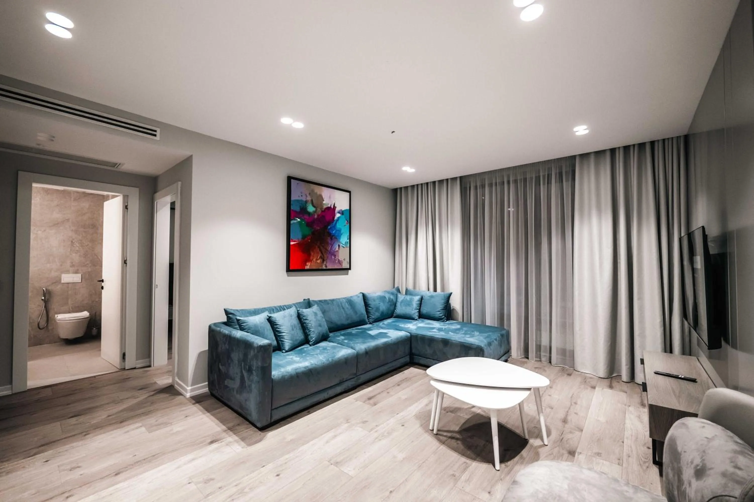 TV and multimedia in Boe Luxury Hotel