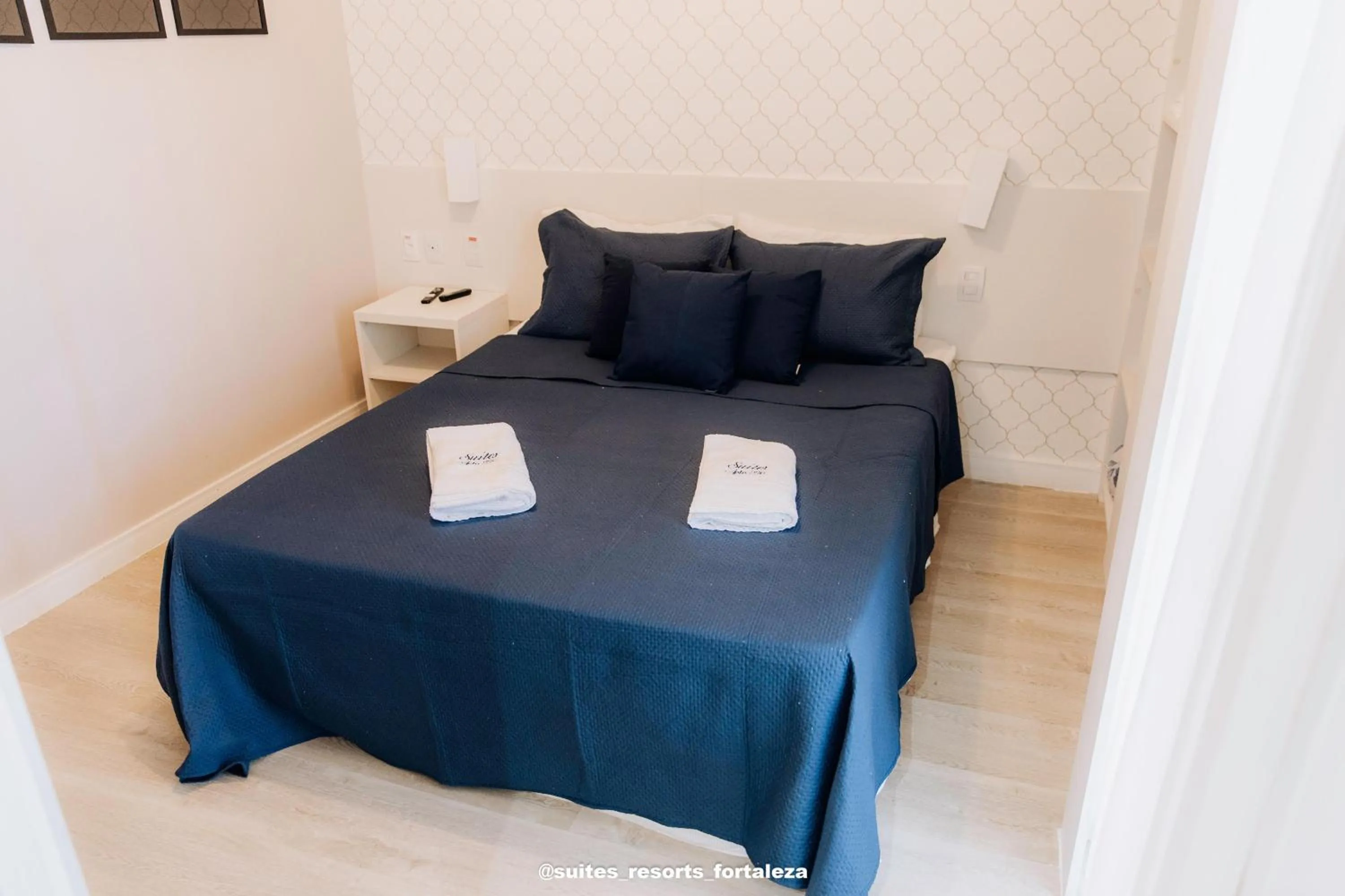 Bed in Apartamento - Pé na areia - Ao lado do parque aquático - Administrado por Anfitrião