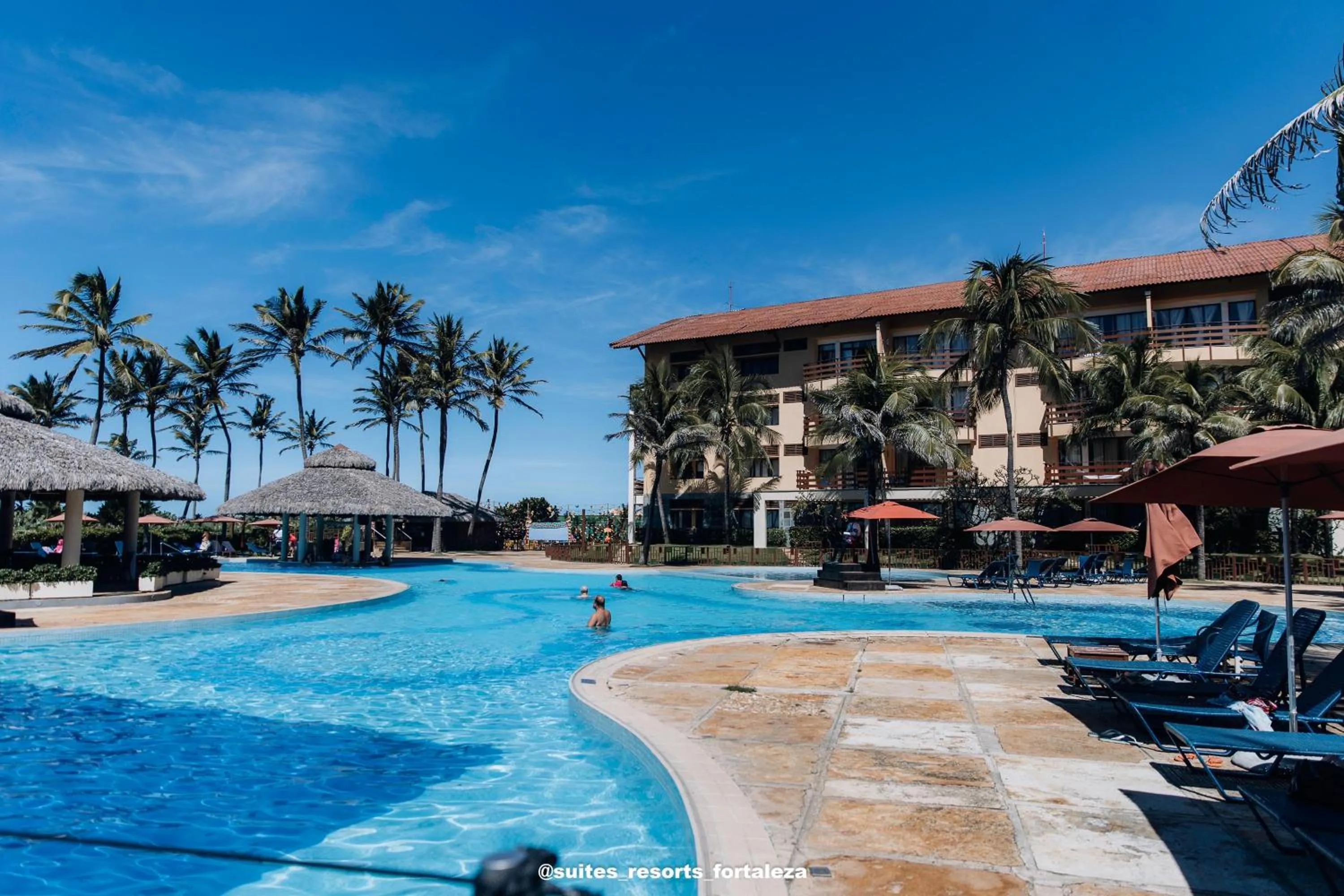 Swimming pool in Apartamento - Pé na areia - Ao lado do parque aquático - Administrado por Anfitrião