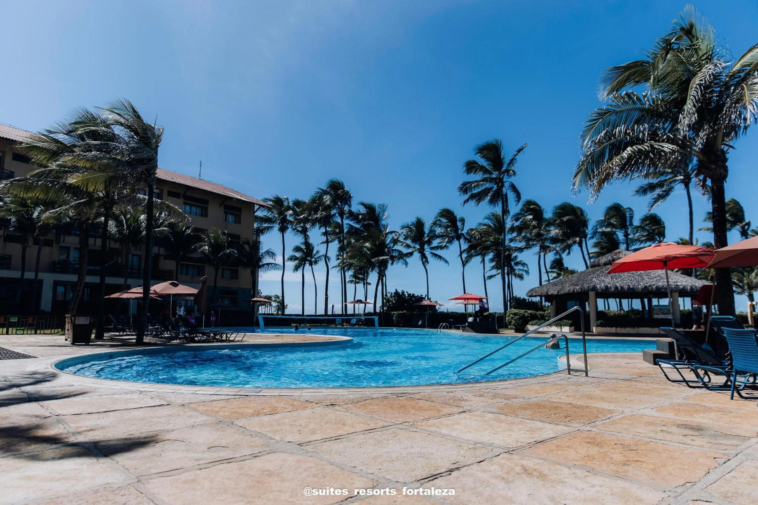 Swimming pool in Apartamento - Pé na areia - Ao lado do parque aquático - Administrado por Anfitrião