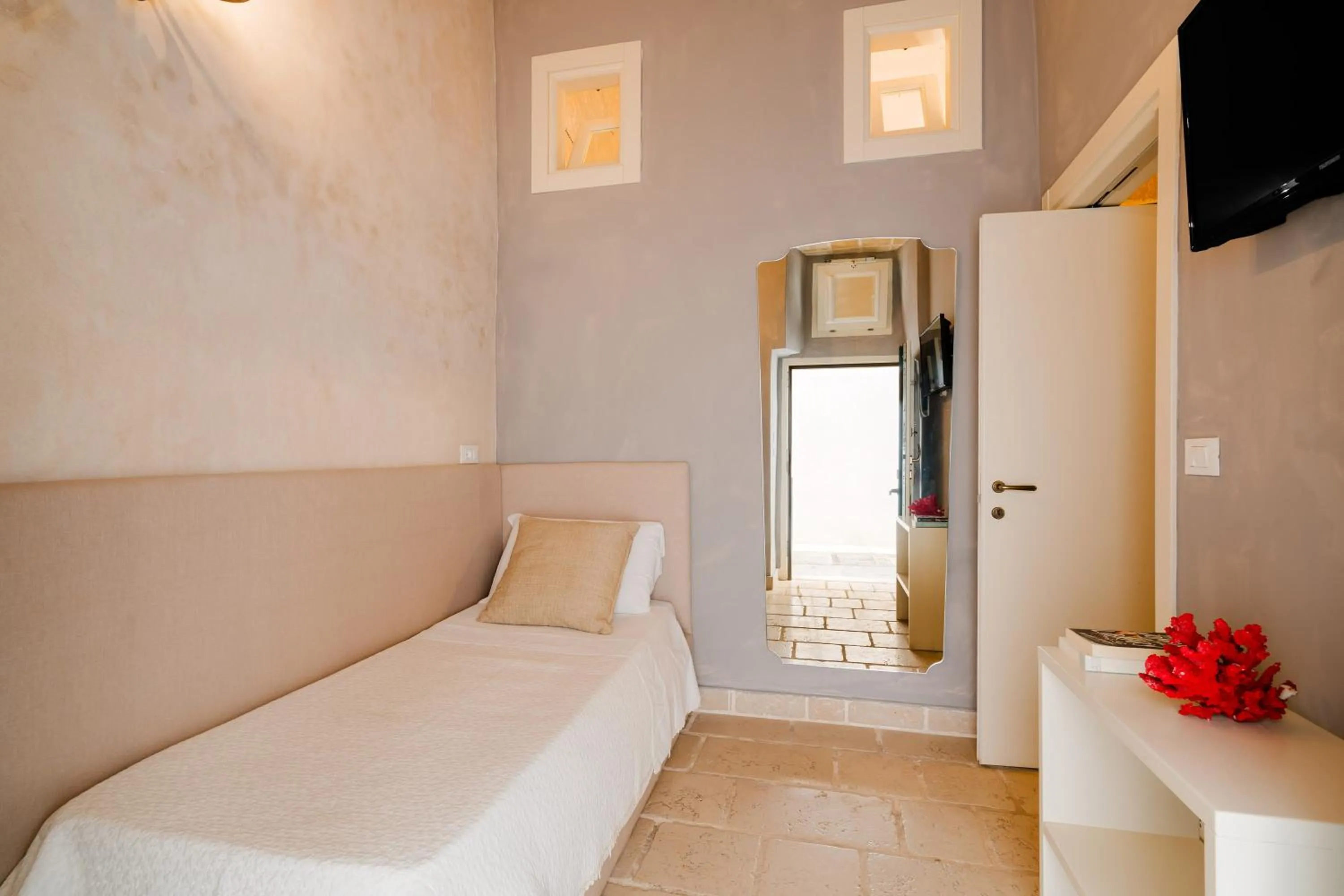 Bed in Relais La Casa del Poeta