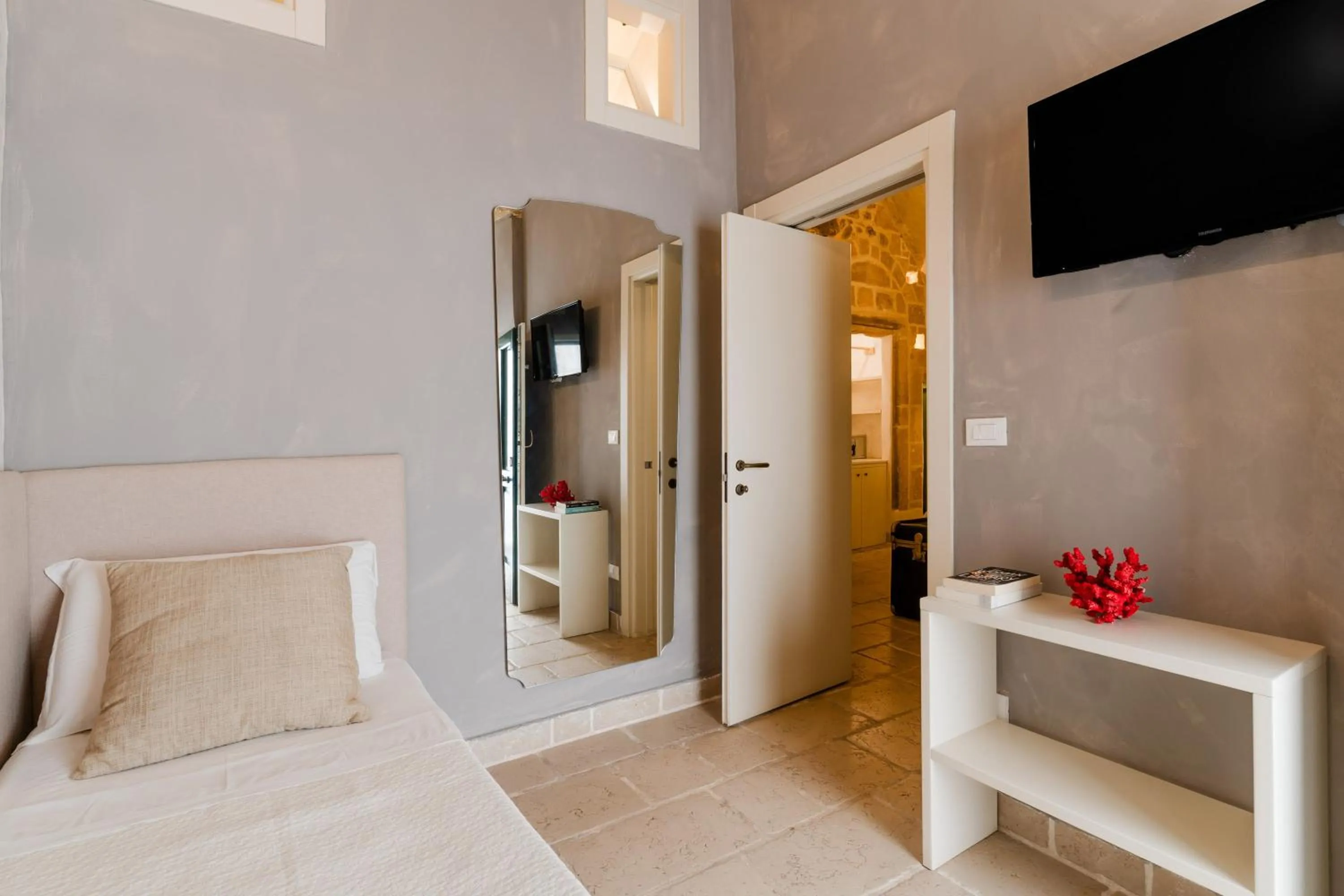 Bed in Relais La Casa del Poeta