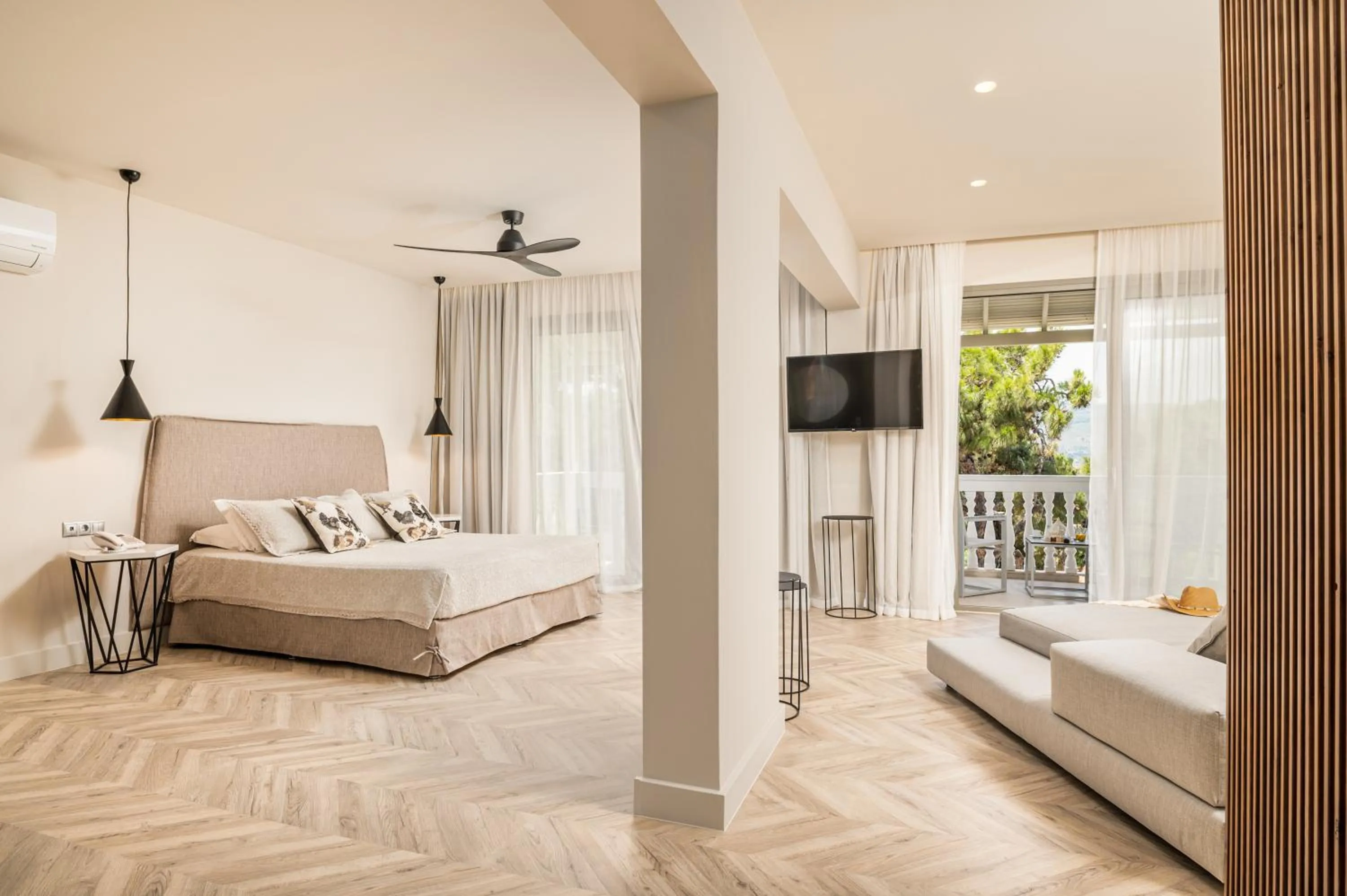 Bed in Ino Hotel & Suites