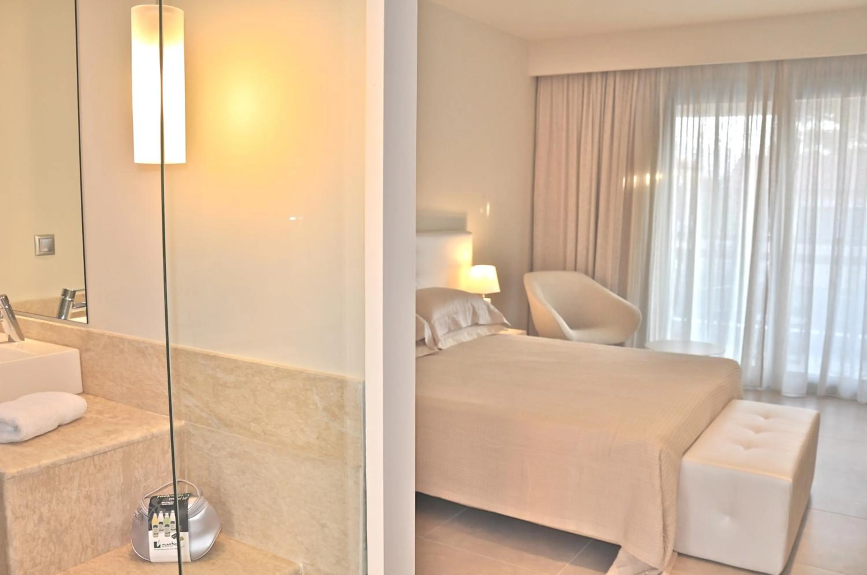 Photo of the whole room, Bed in Ino Hotel & Suites