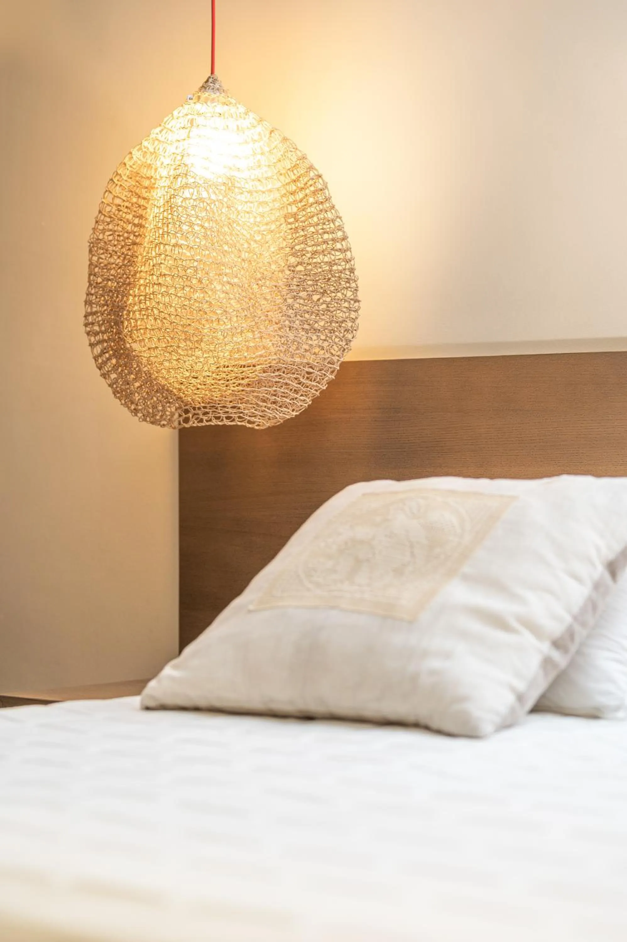 Bed in Ino Hotel & Suites