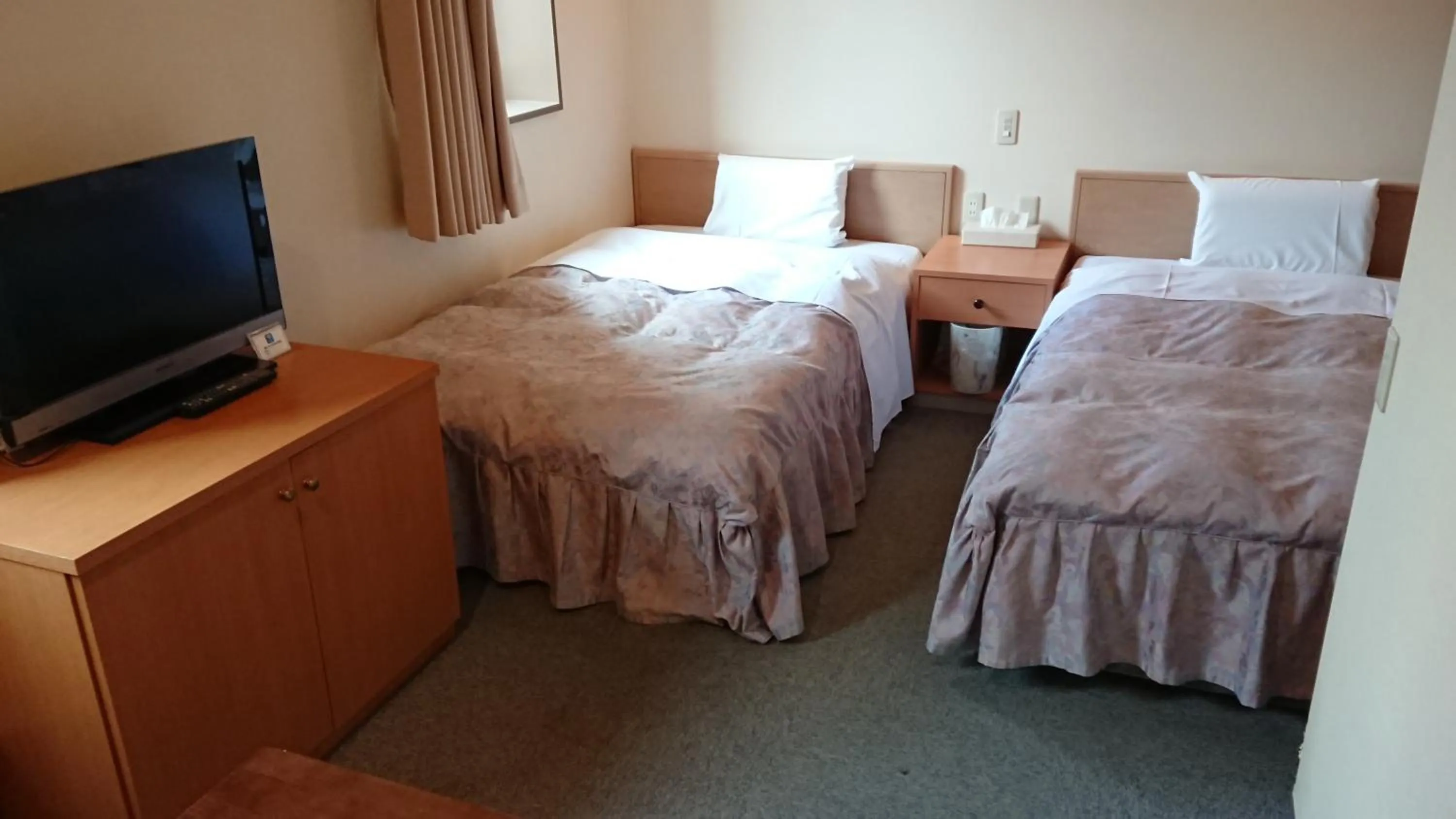 Bed in Hotel Muroran Hills