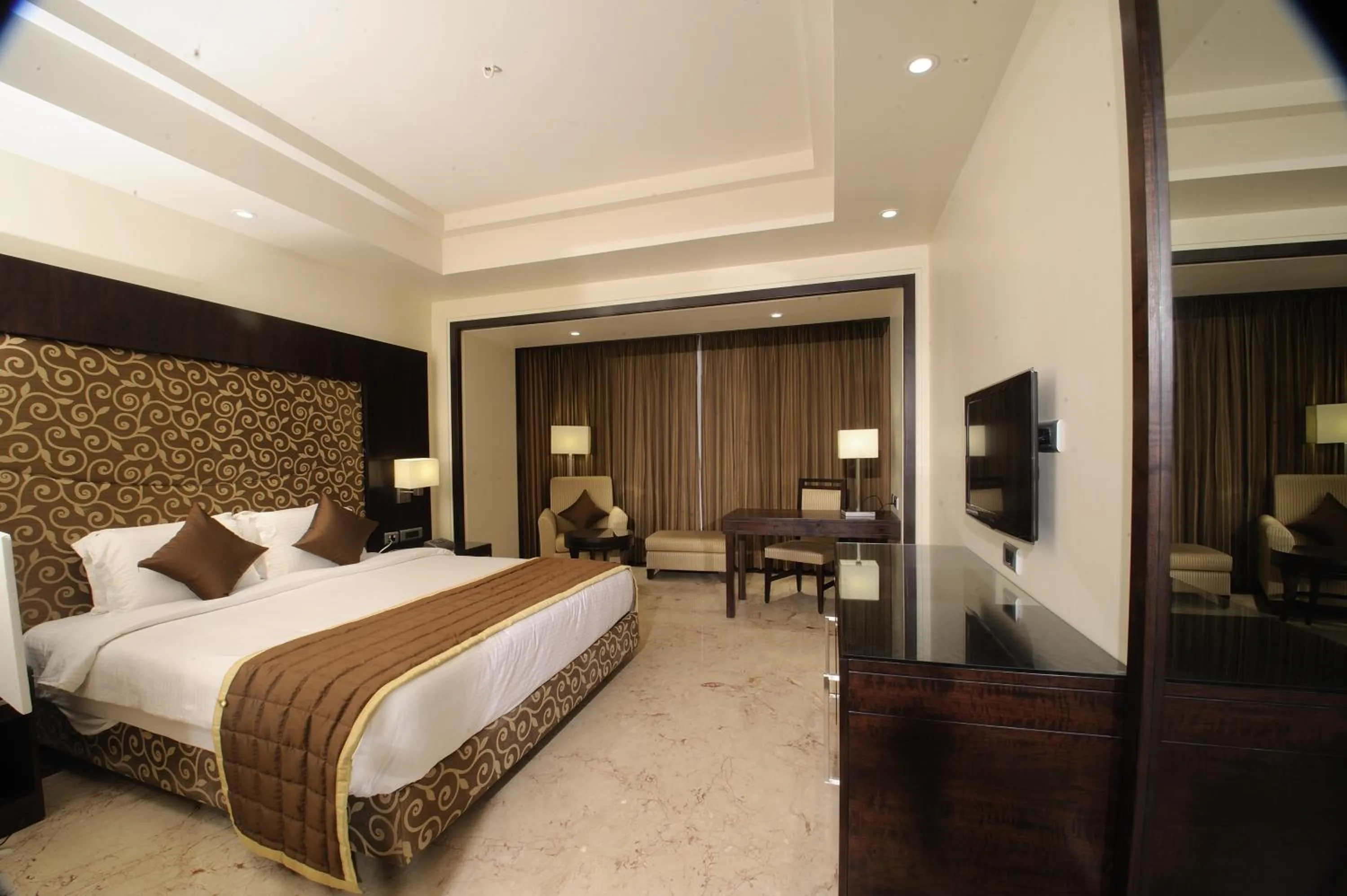 Bed in Anandha Inn Convention Centre and Suites