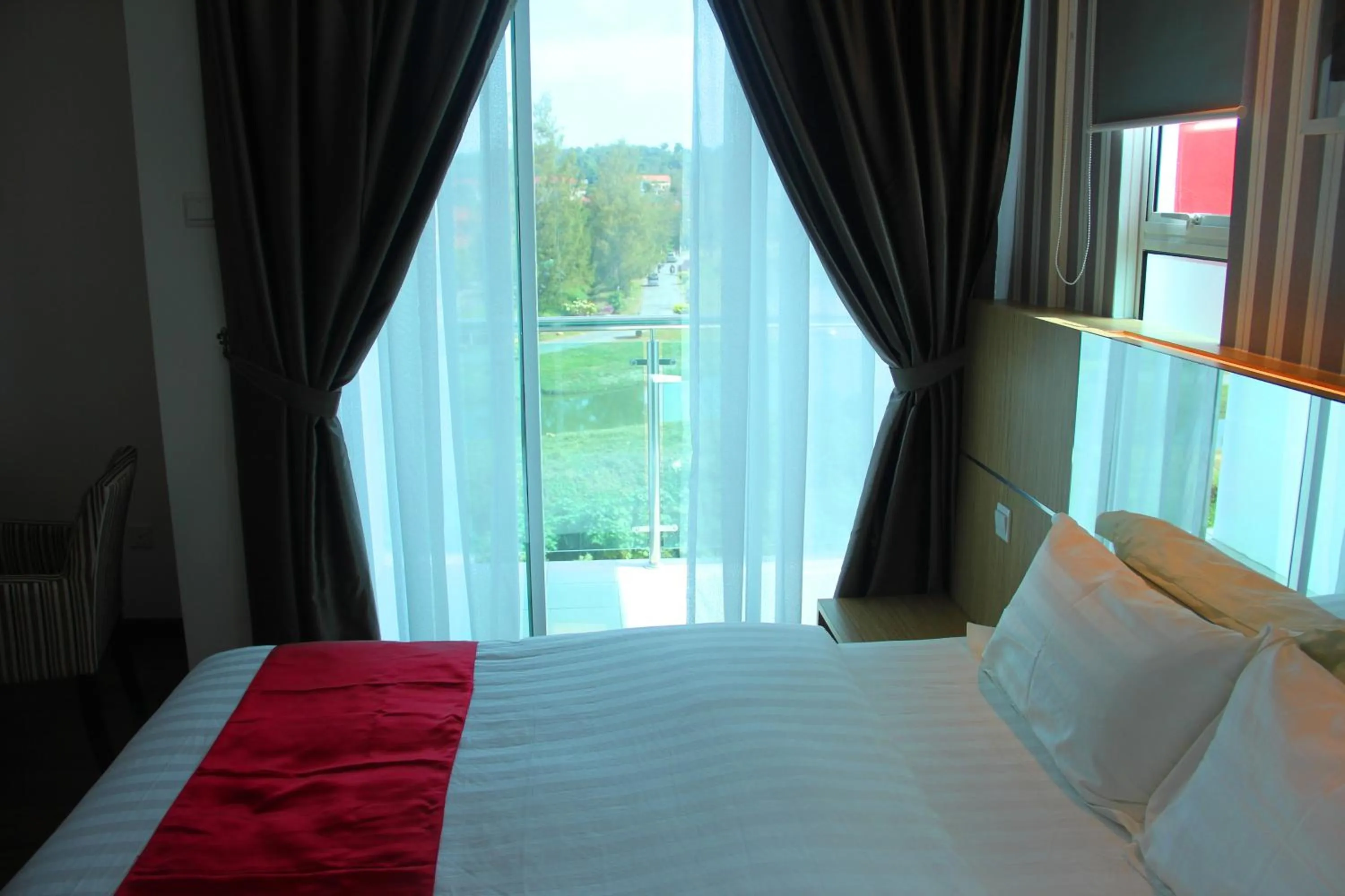 Bed in 906 Premier Hotel