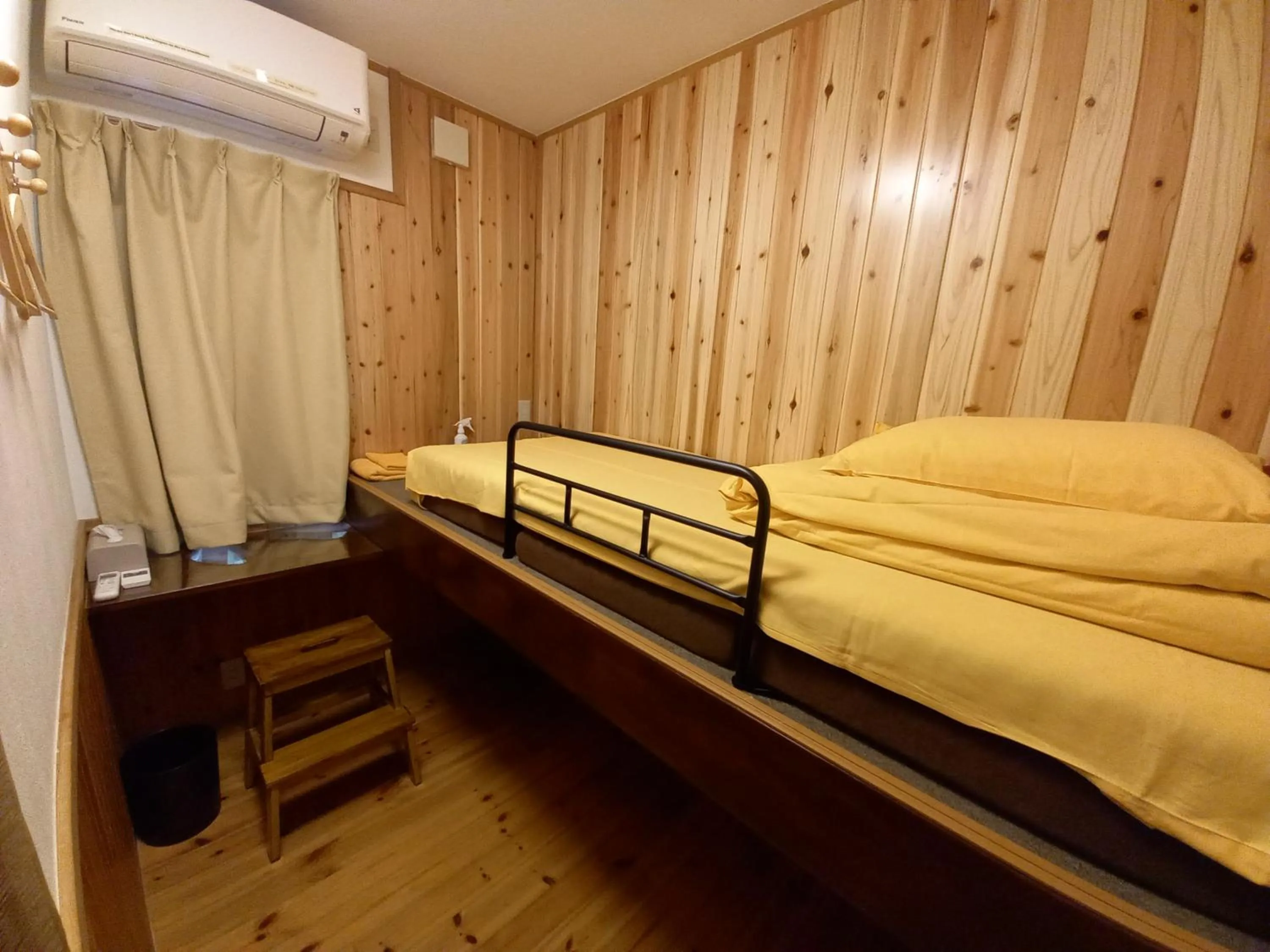 Bedroom, Bed in Orange Cabin Inn far from station