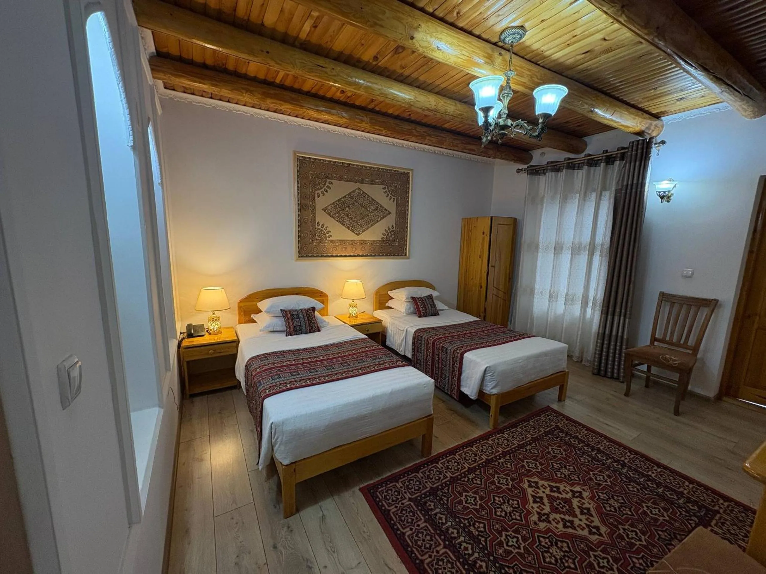 Bed in Porso Boutique Hotel