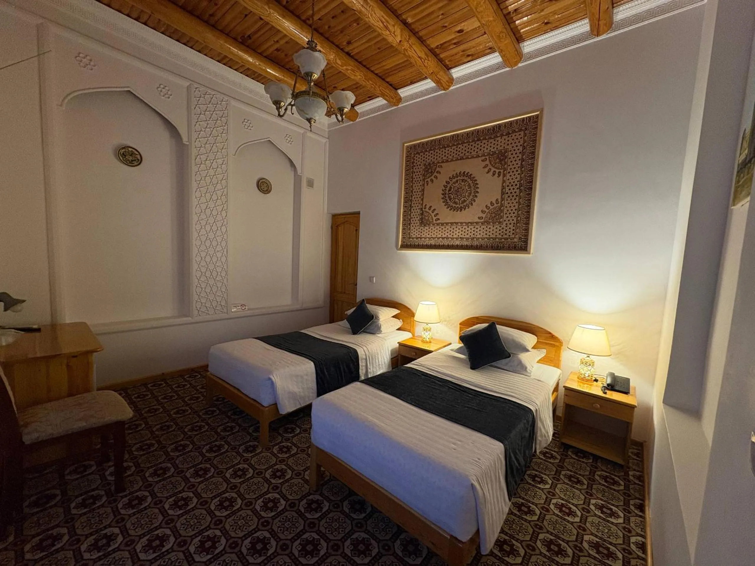 Bed in Porso Boutique Hotel