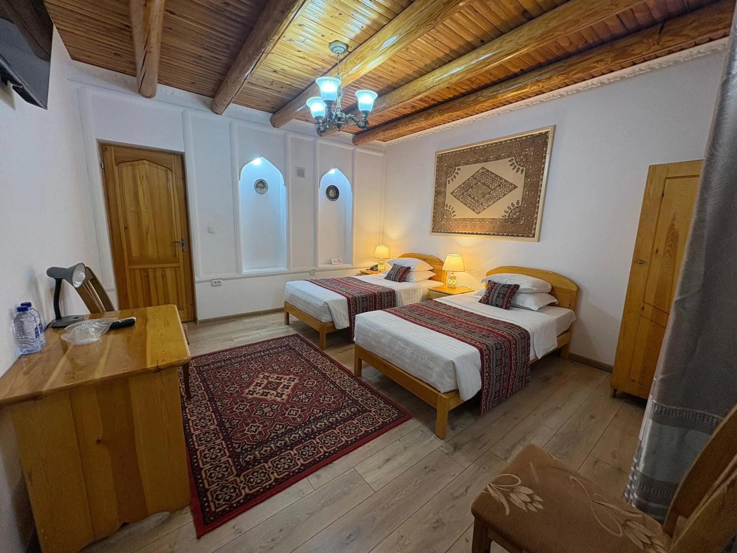 Bed in Porso Boutique Hotel