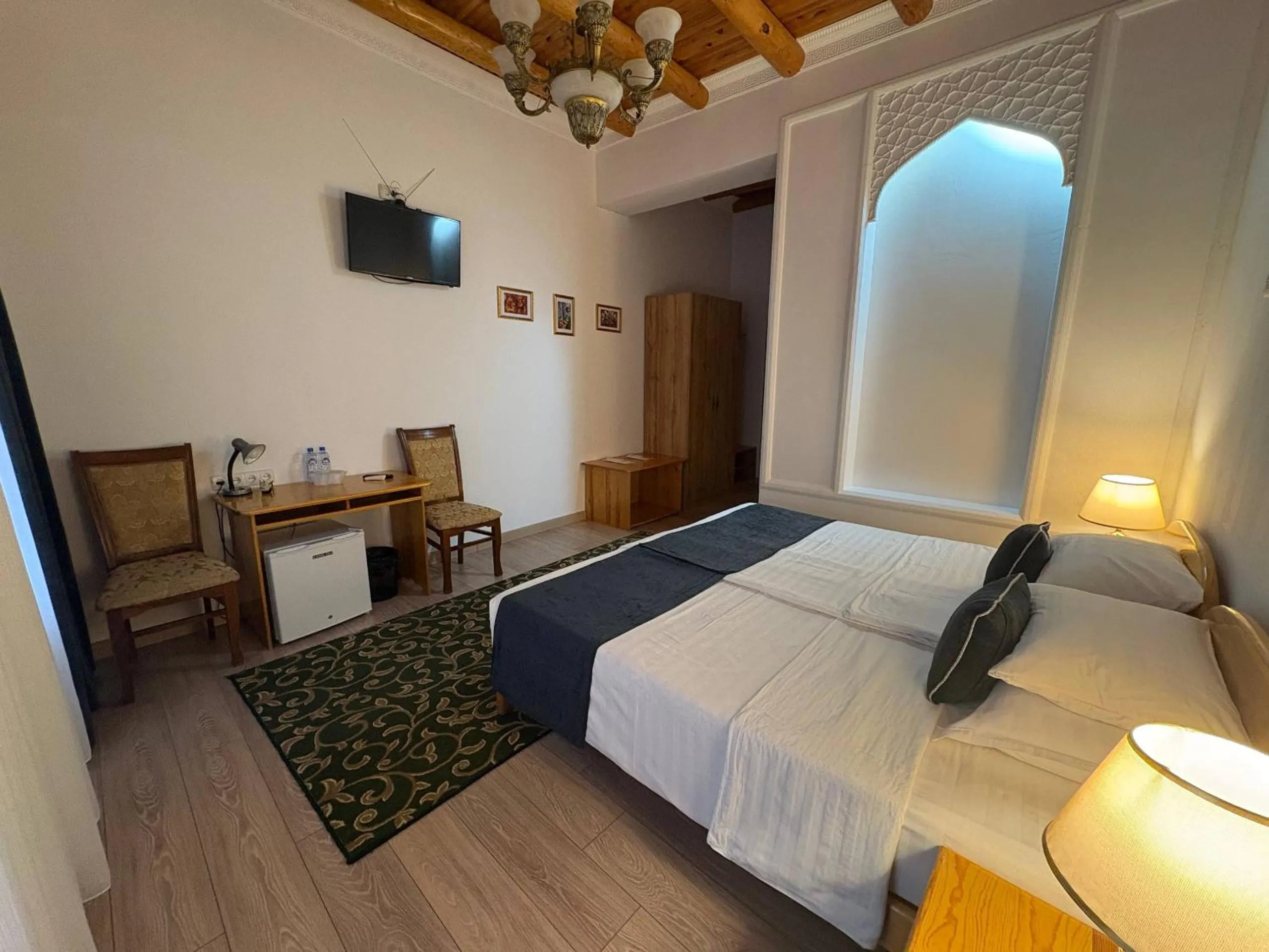 Bed in Porso Boutique Hotel