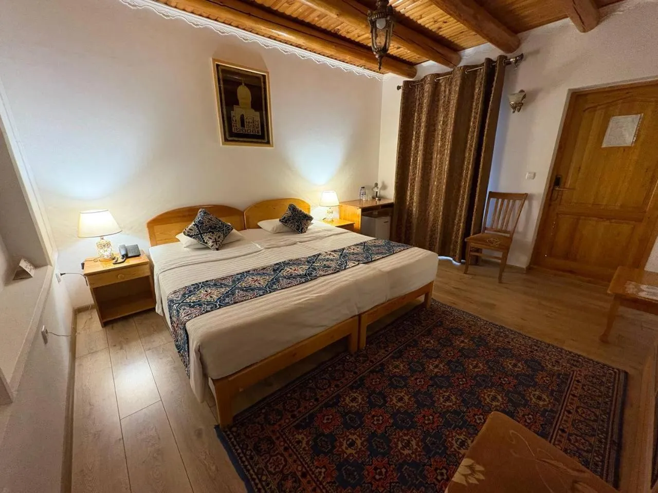 Bed in Porso Boutique Hotel