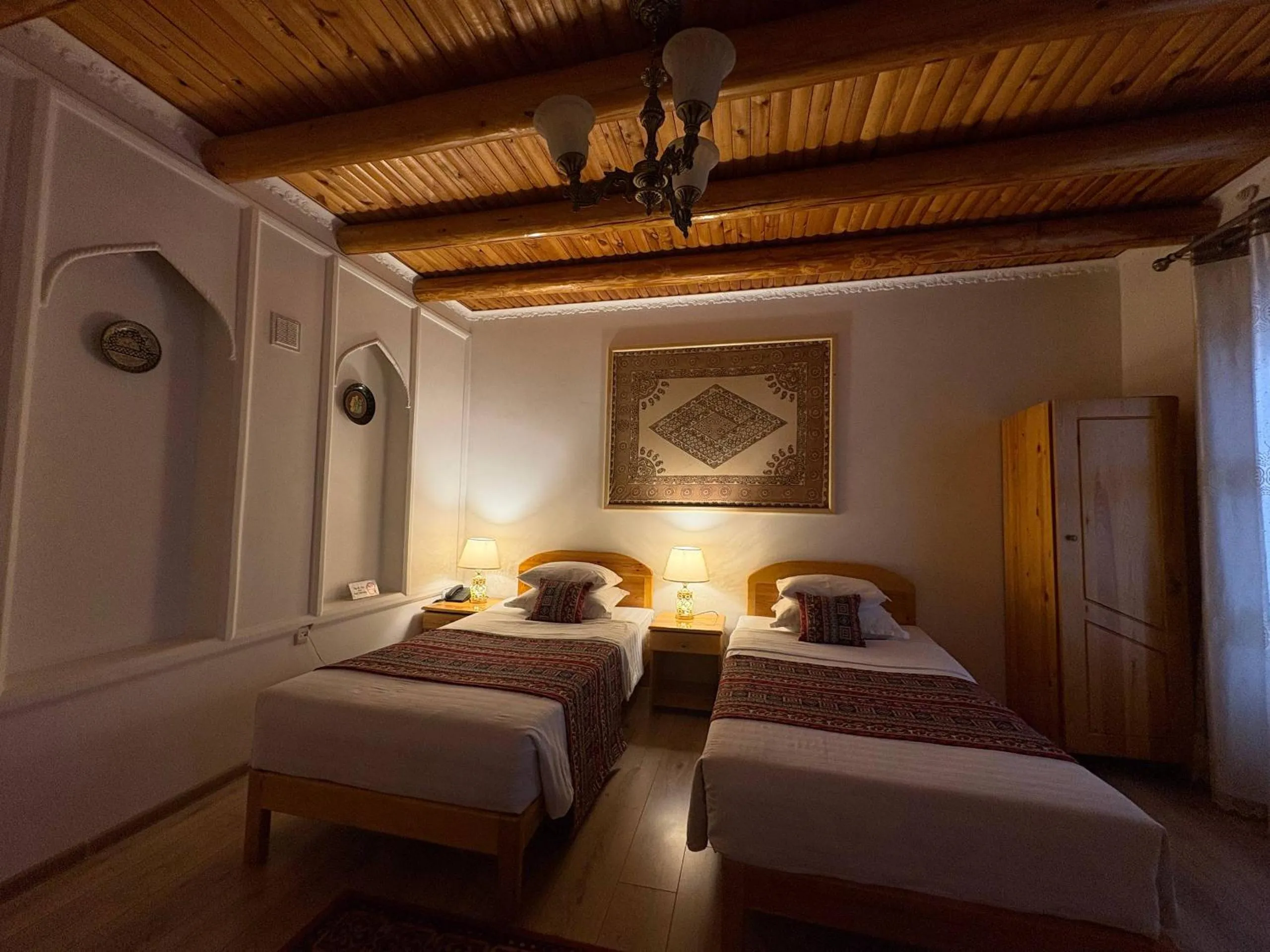 Bed in Porso Boutique Hotel