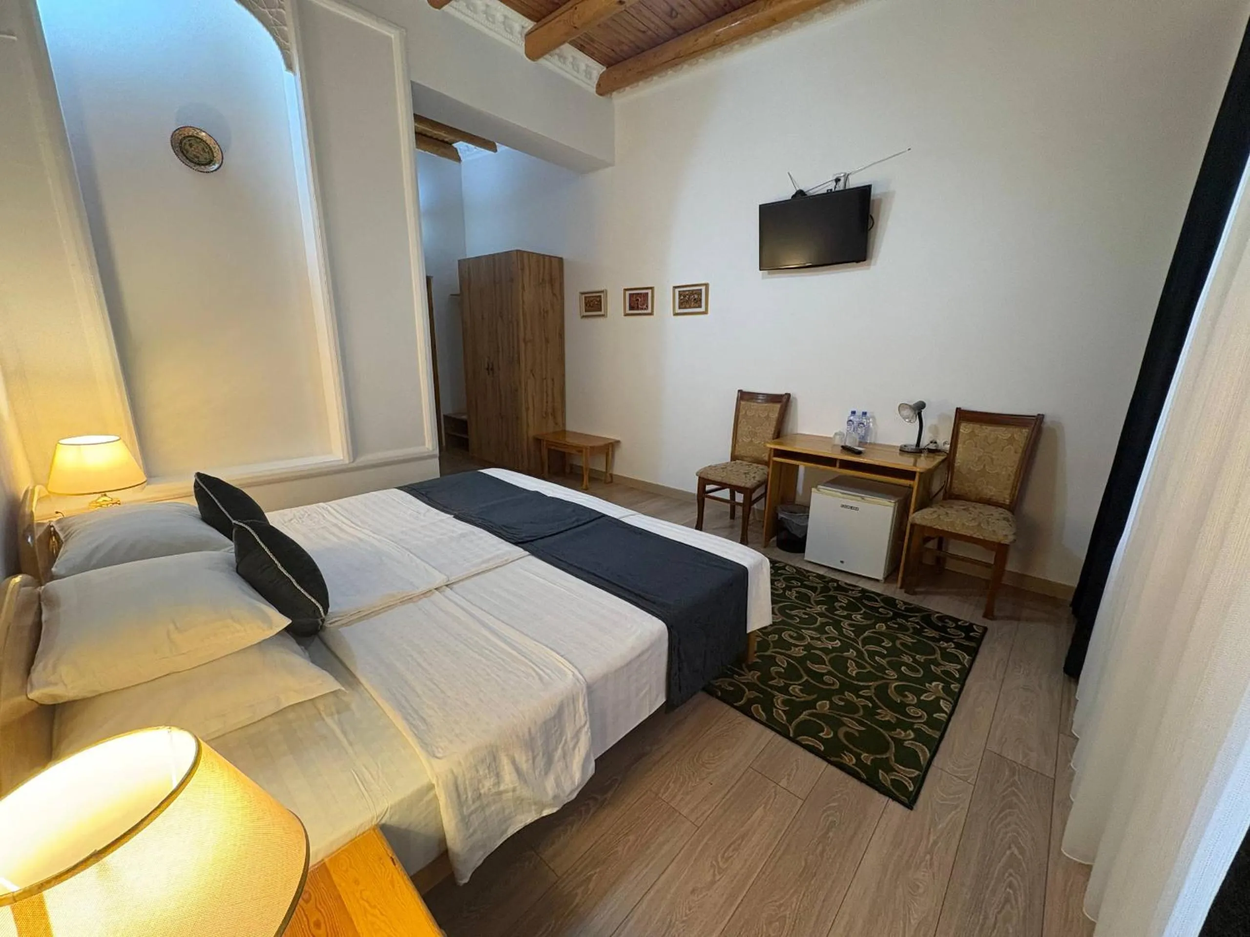 Bed in Porso Boutique Hotel