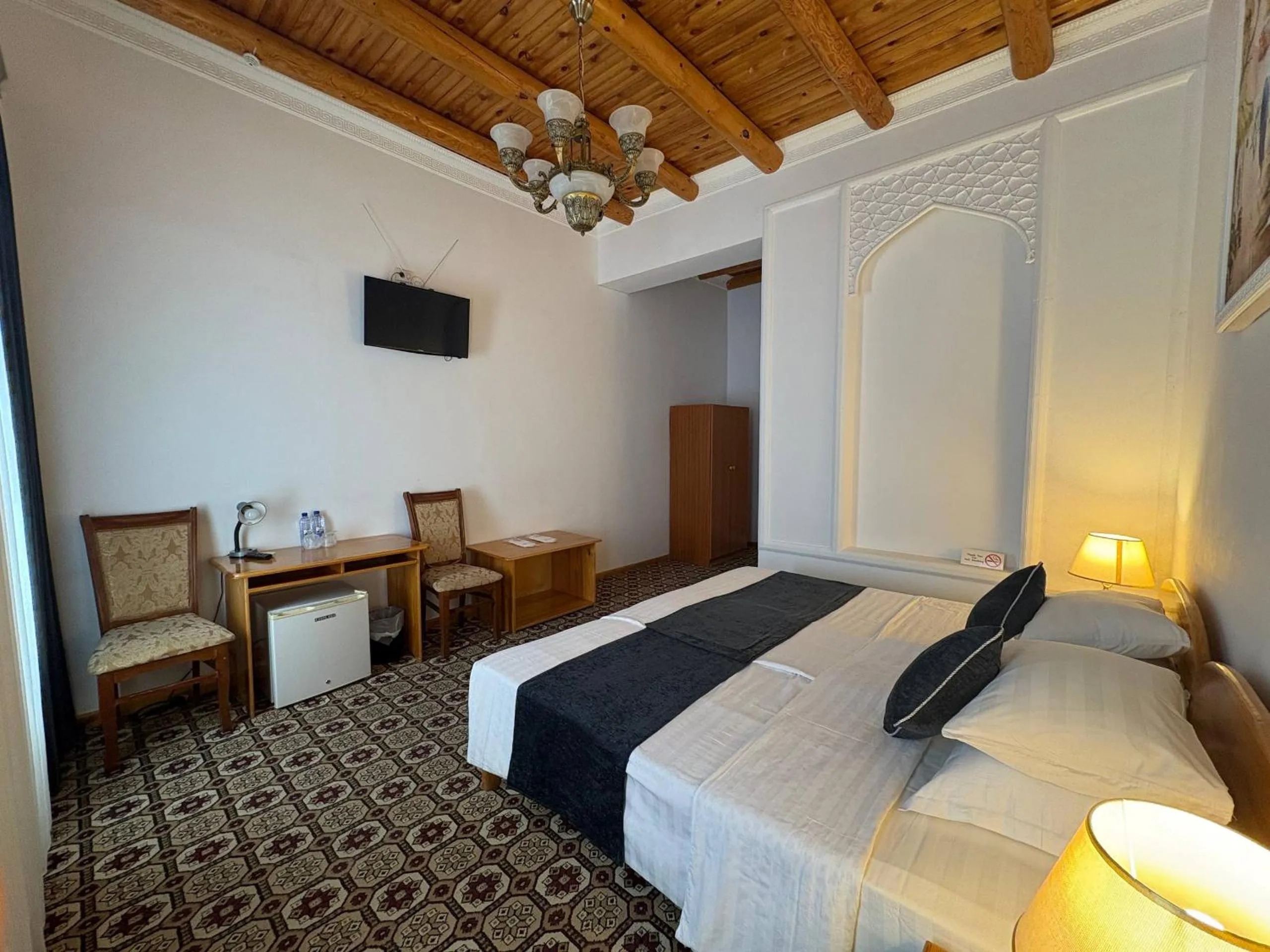 Bed in Porso Boutique Hotel