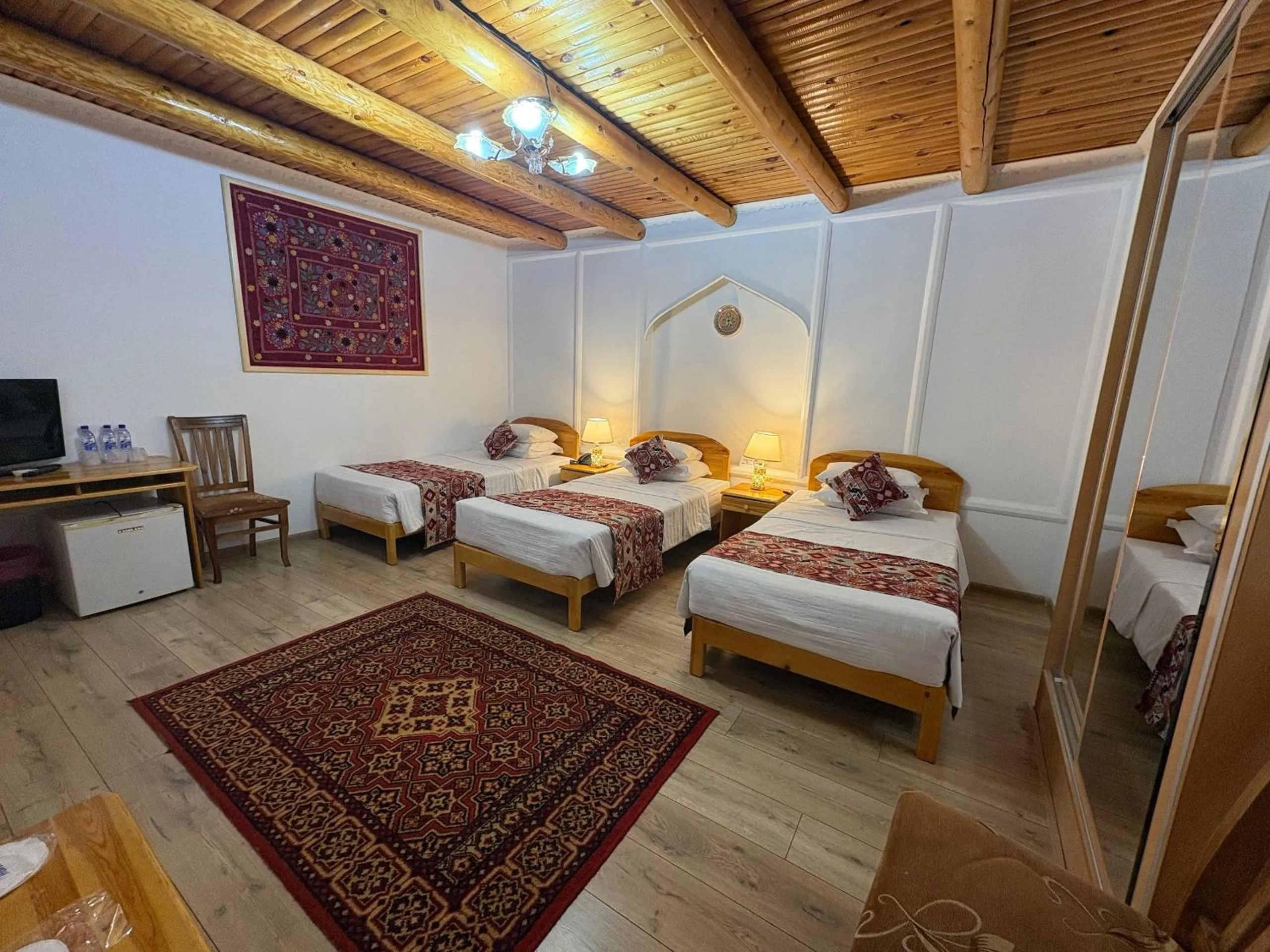 Bed in Porso Boutique Hotel