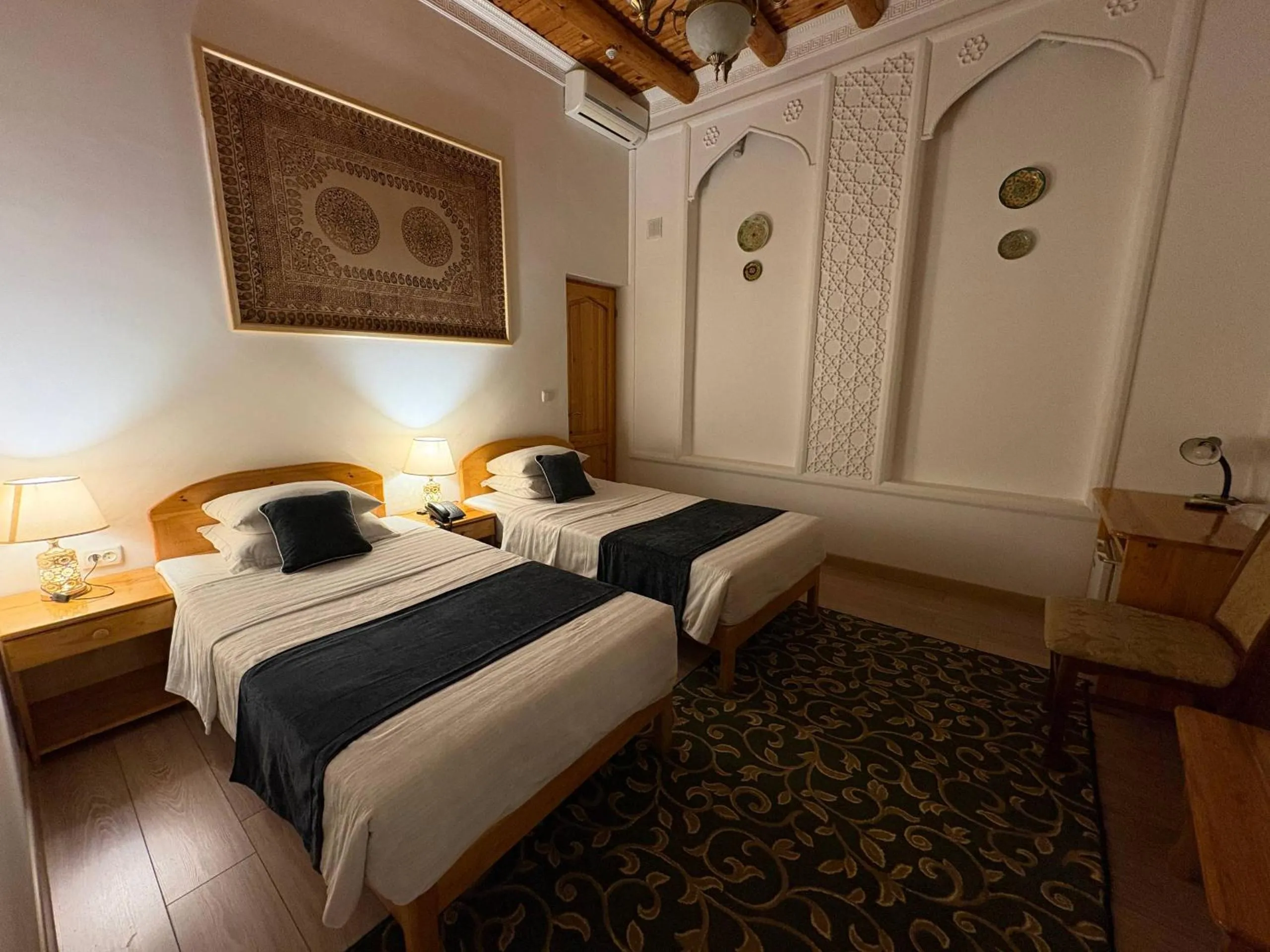 Bed in Porso Boutique Hotel