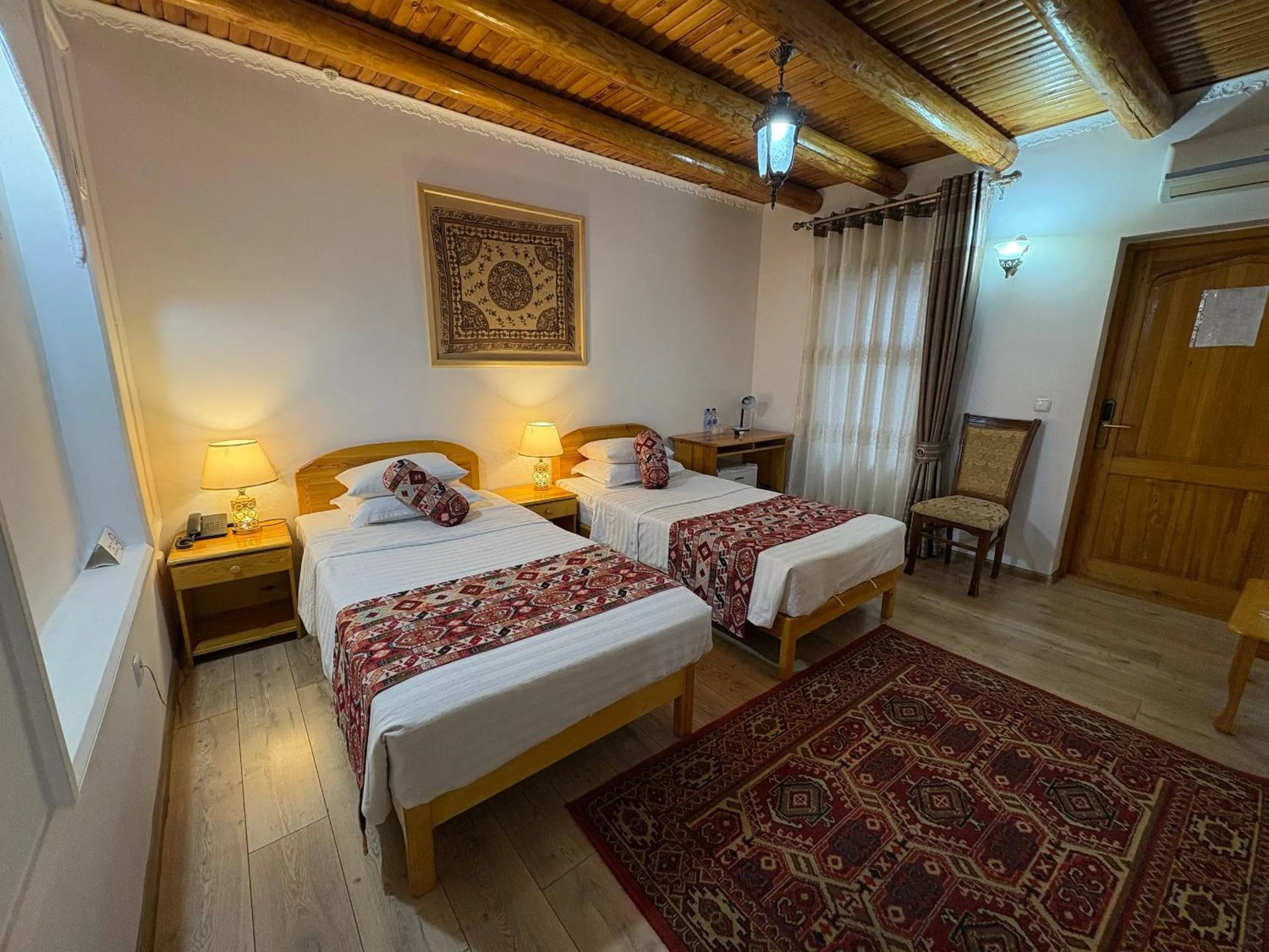 Bed in Porso Boutique Hotel