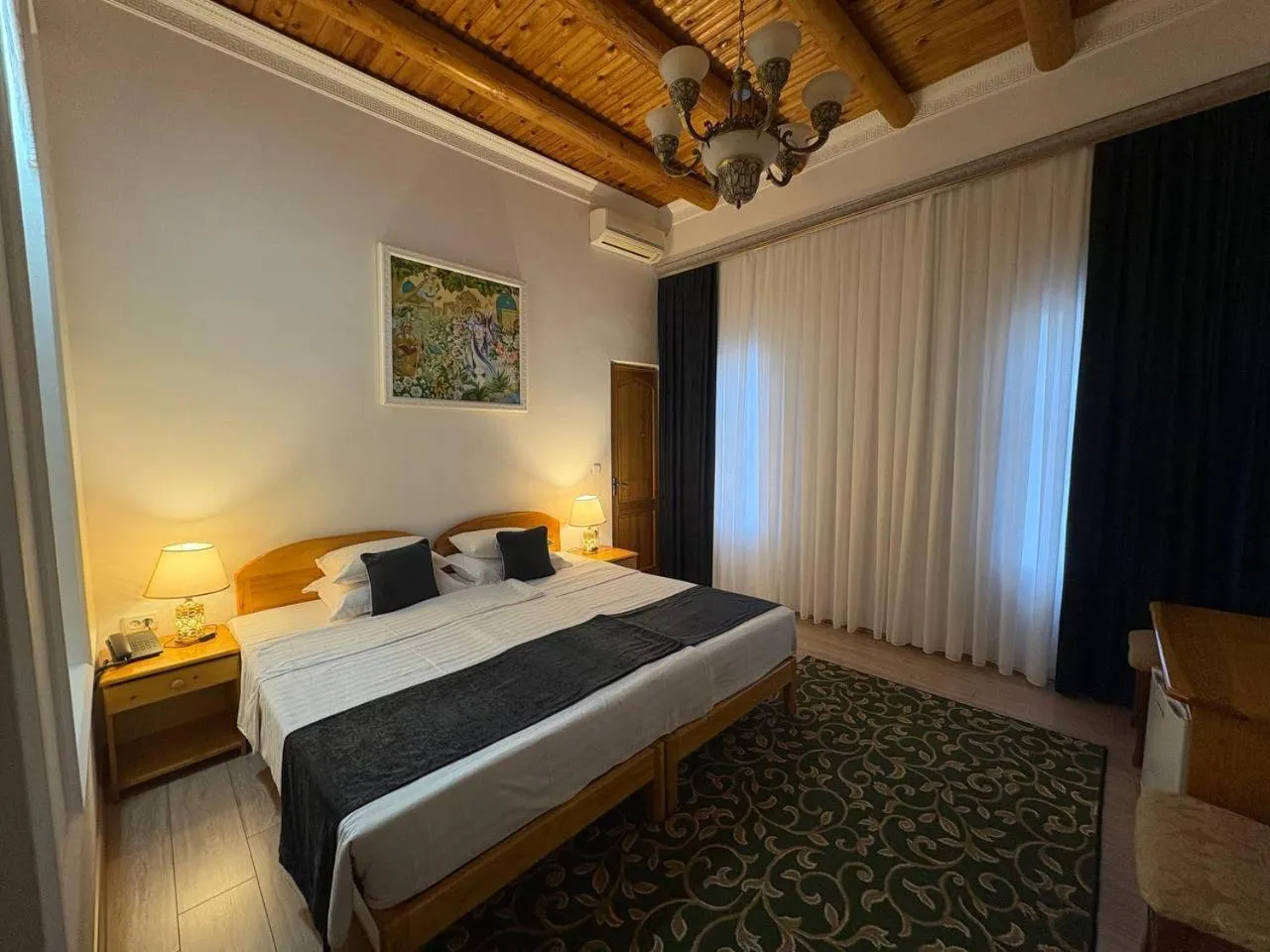 Bed in Porso Boutique Hotel