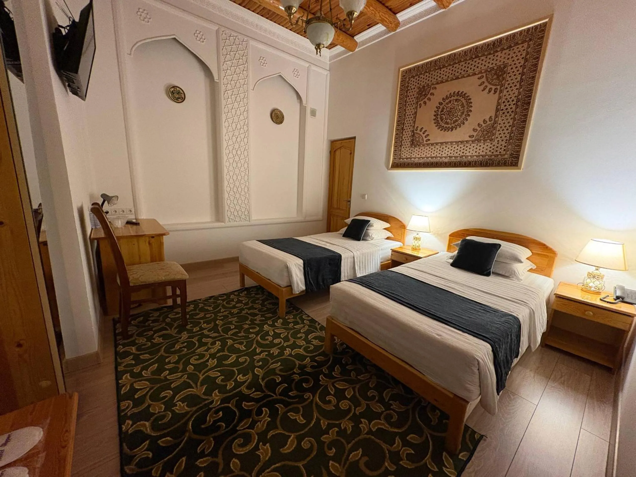 Bed in Porso Boutique Hotel