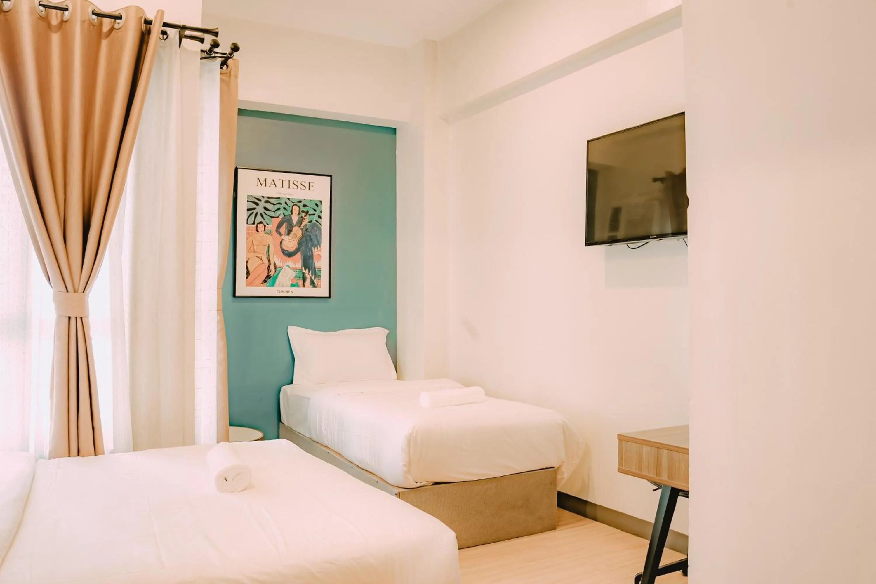 Photo of the whole room, Bed in I Suites Hotel Malate