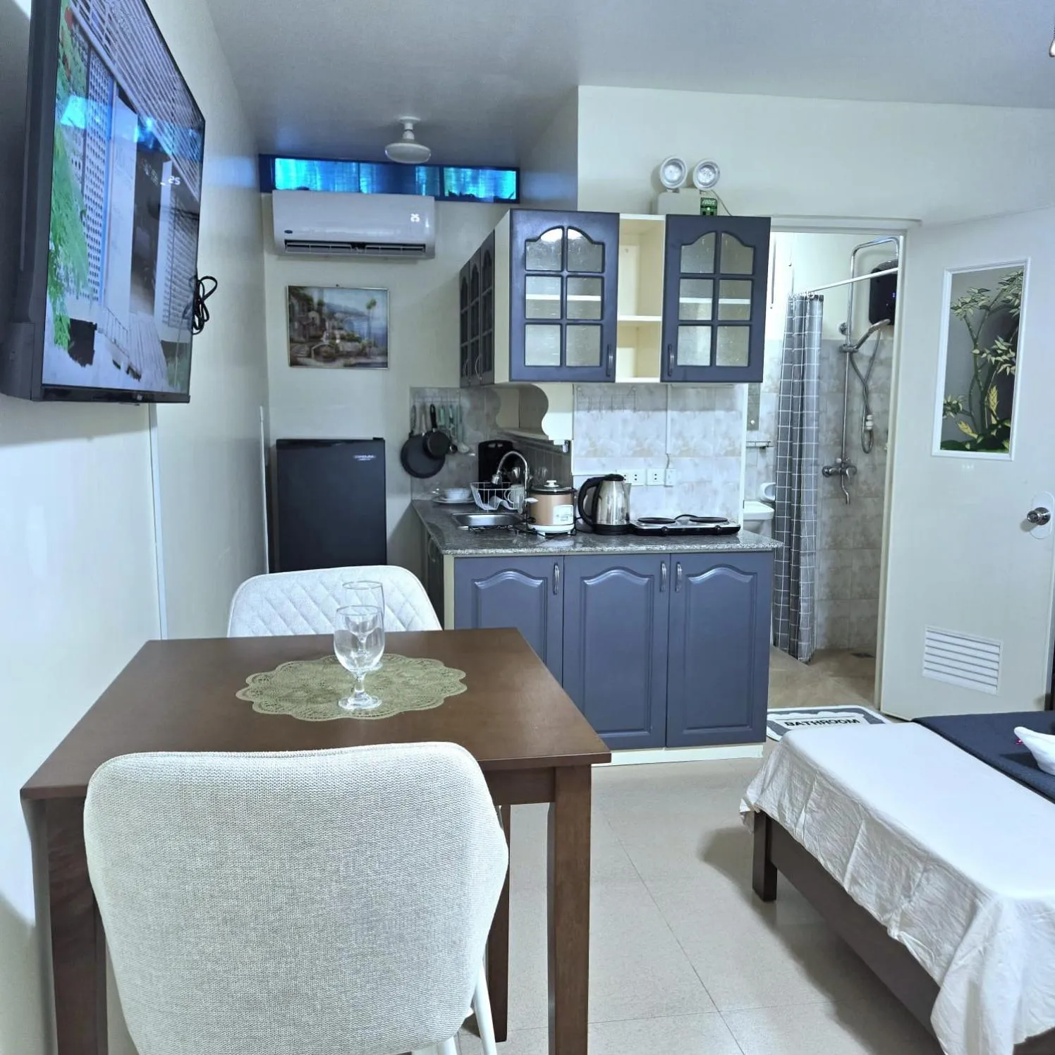 Kitchen or kitchenette in Mangotree Apartel & Resort