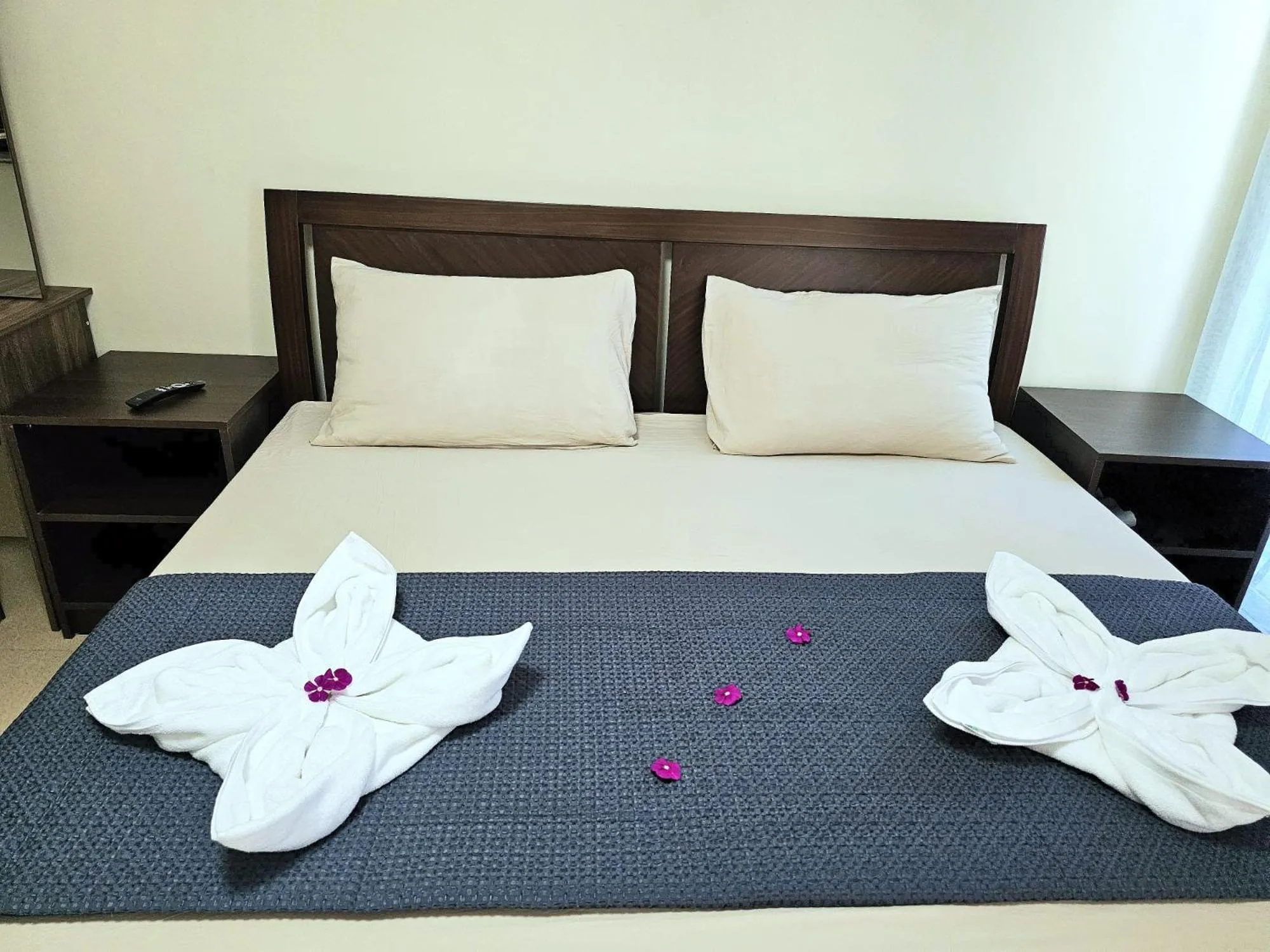 Bed in Mangotree Apartel & Resort