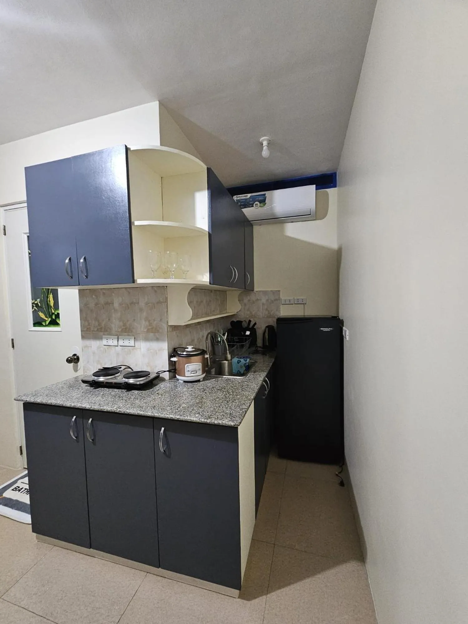 kitchen in Mangotree Apartel & Resort