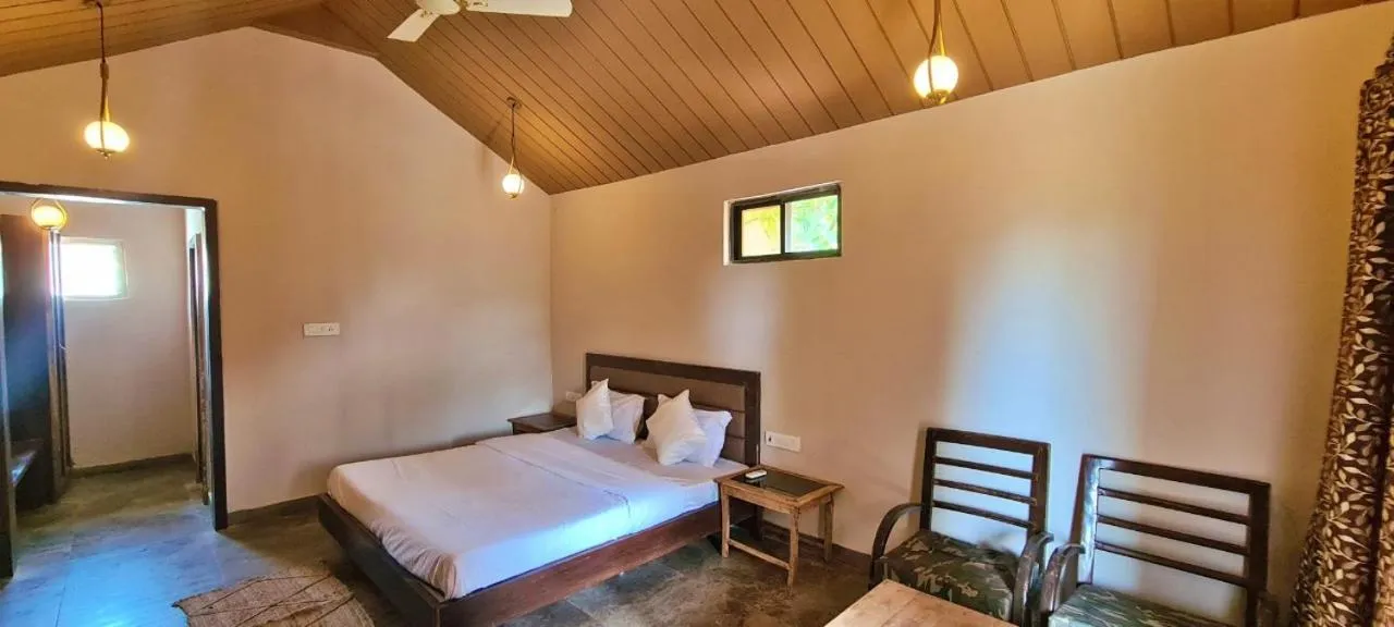 Bed in Greenscape Resort Satpura