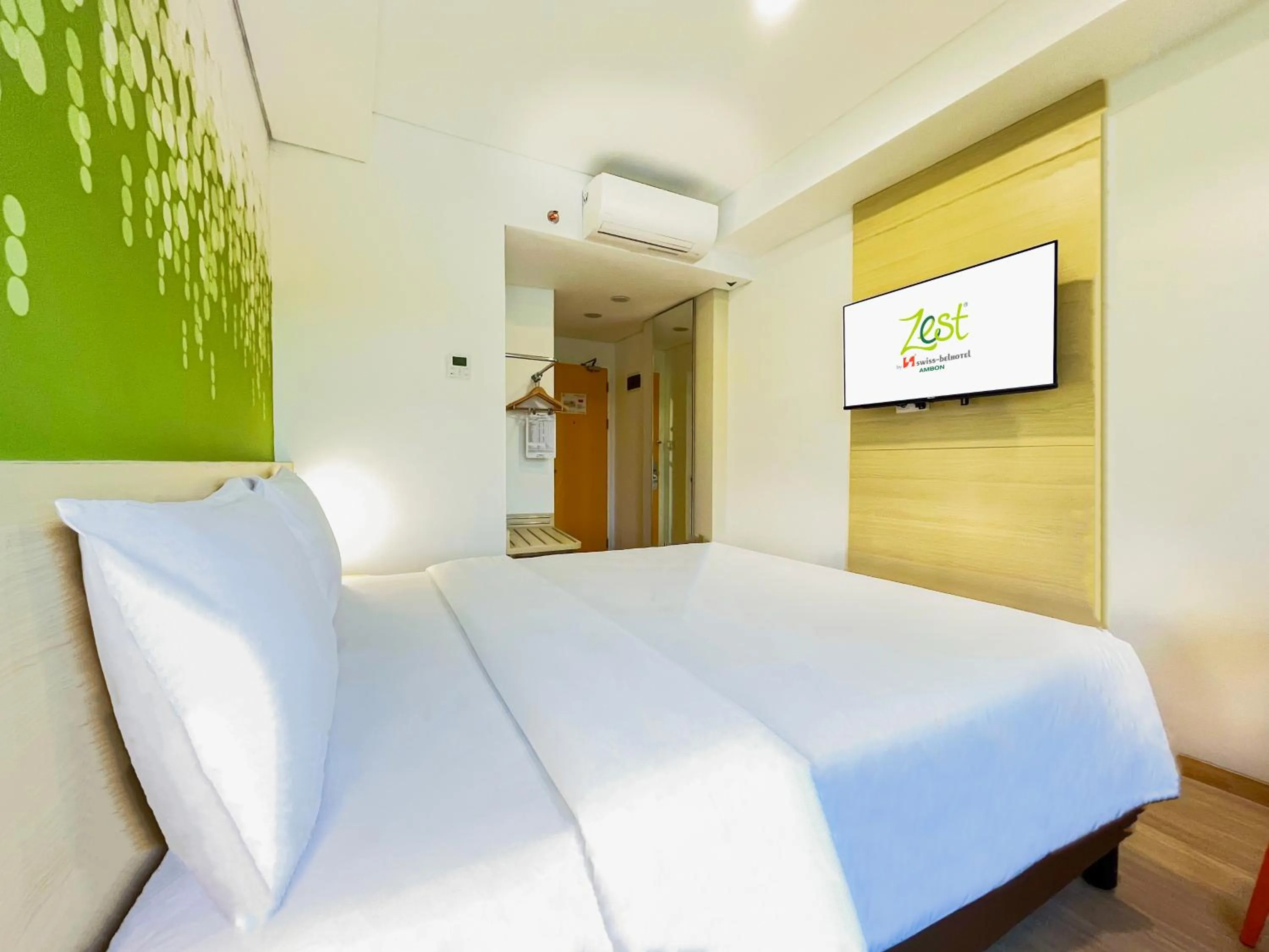 Bed in Zest Ambon by Swiss-Belhotel International