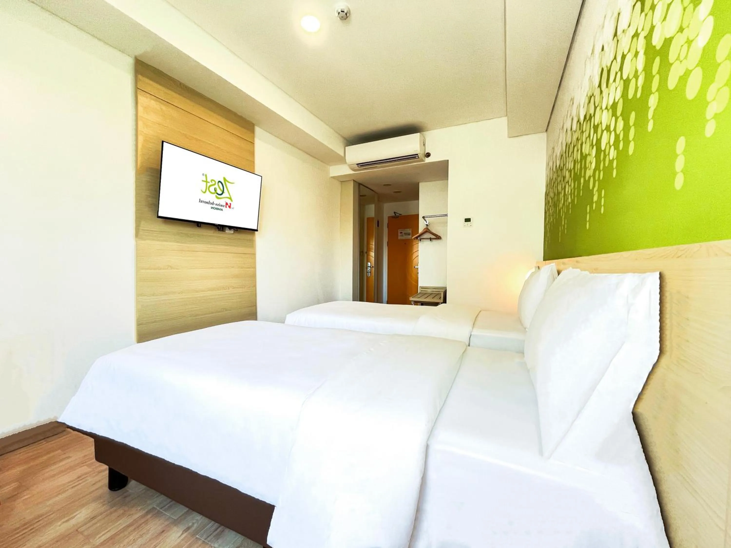 Bed in Zest Ambon by Swiss-Belhotel International